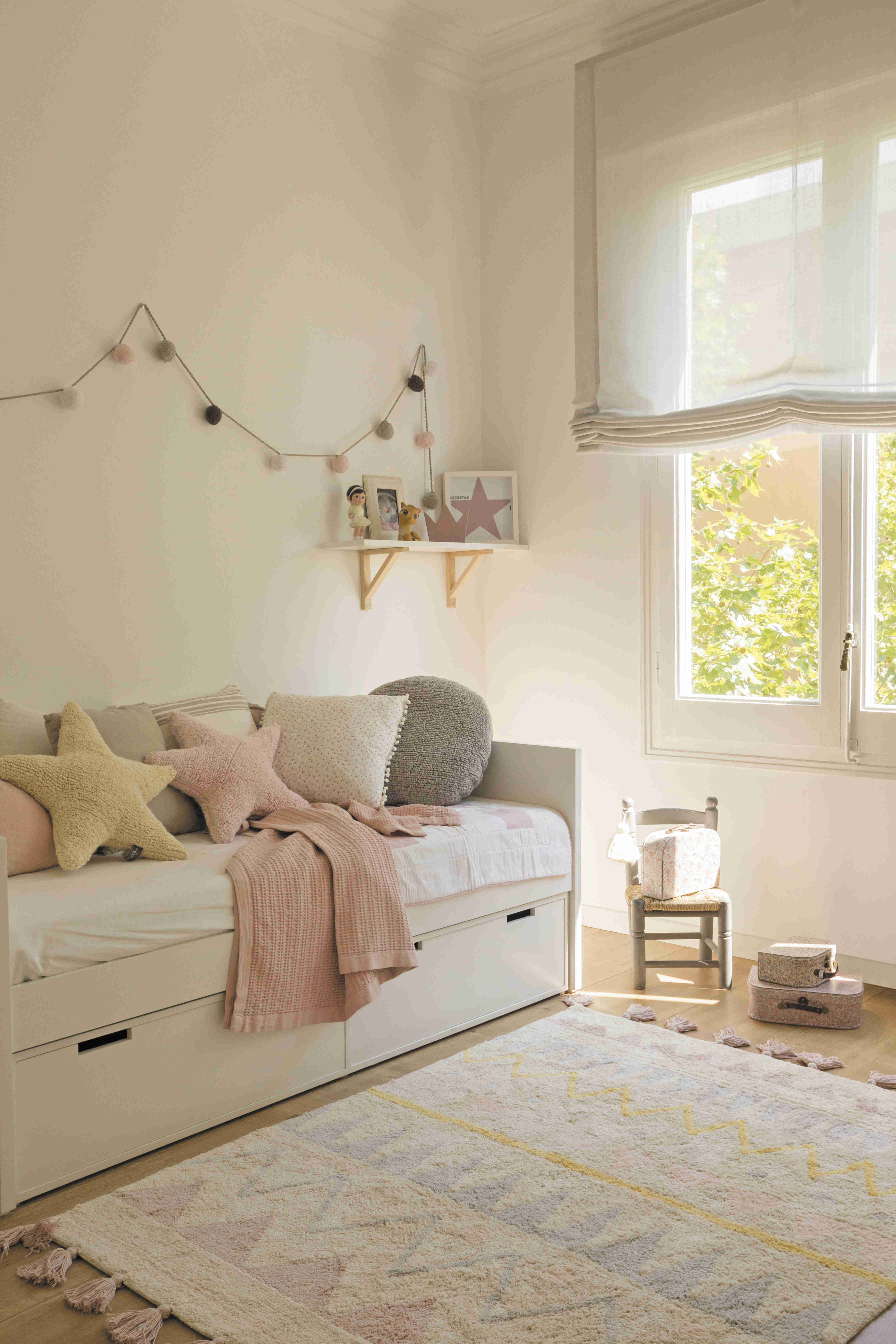 Rectangular natural beige rug with pink