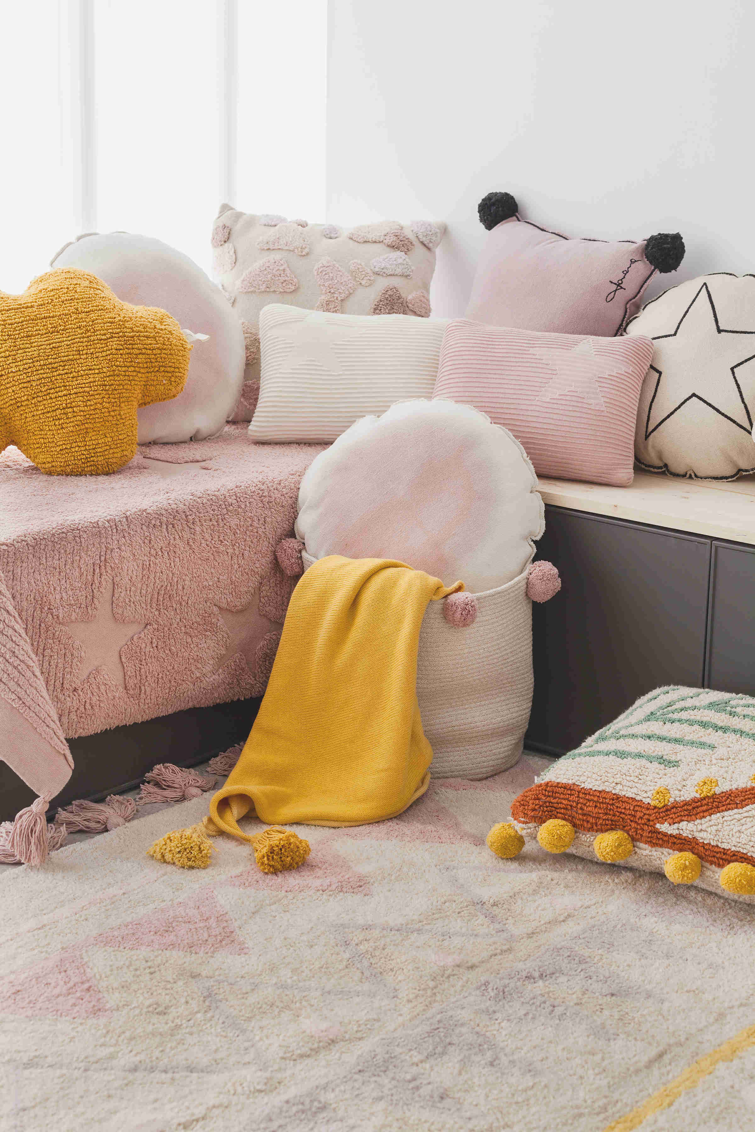 yellow and grey aztec pattern and pink tassel border