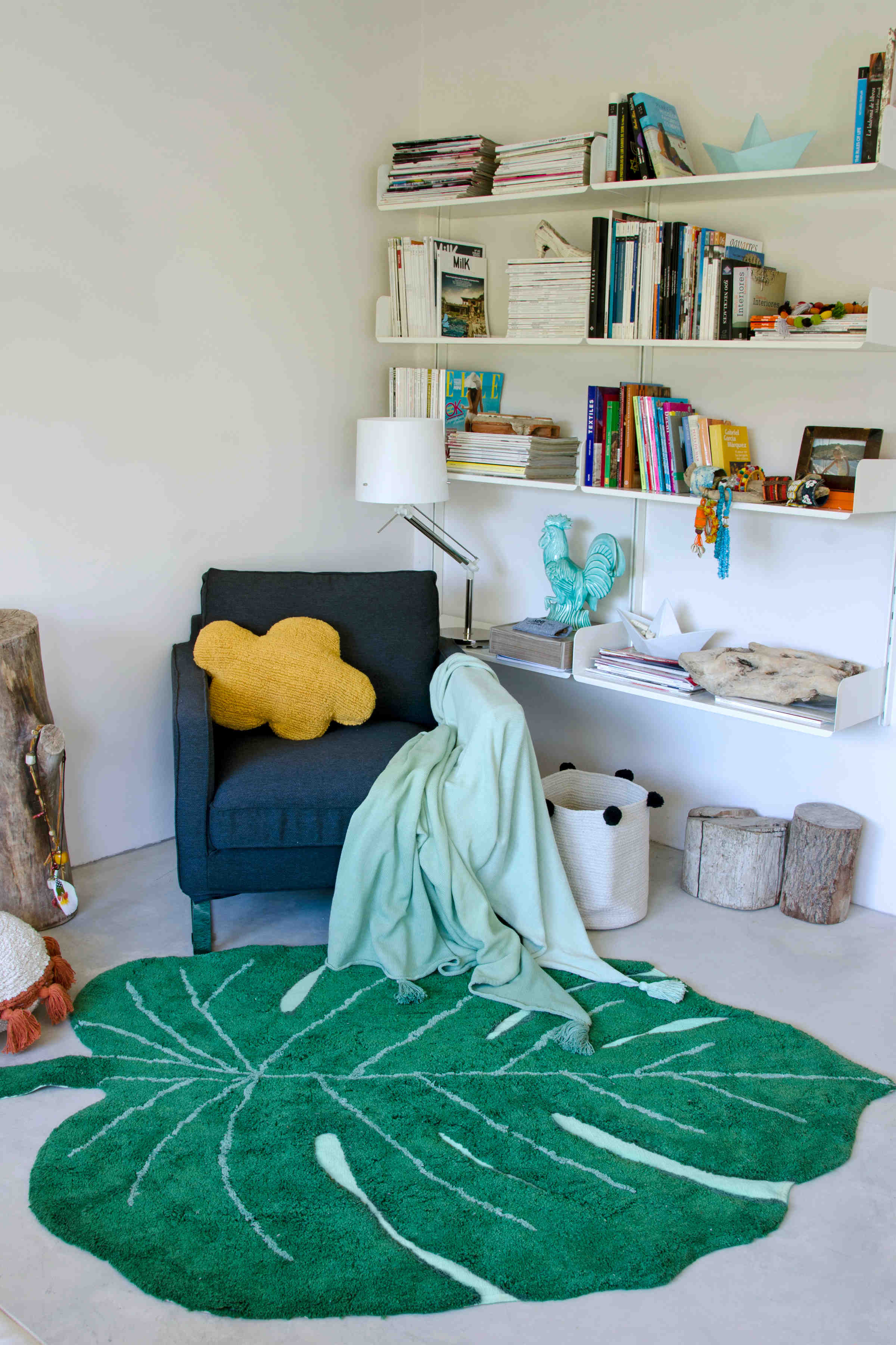 A large green leaf-shaped rug