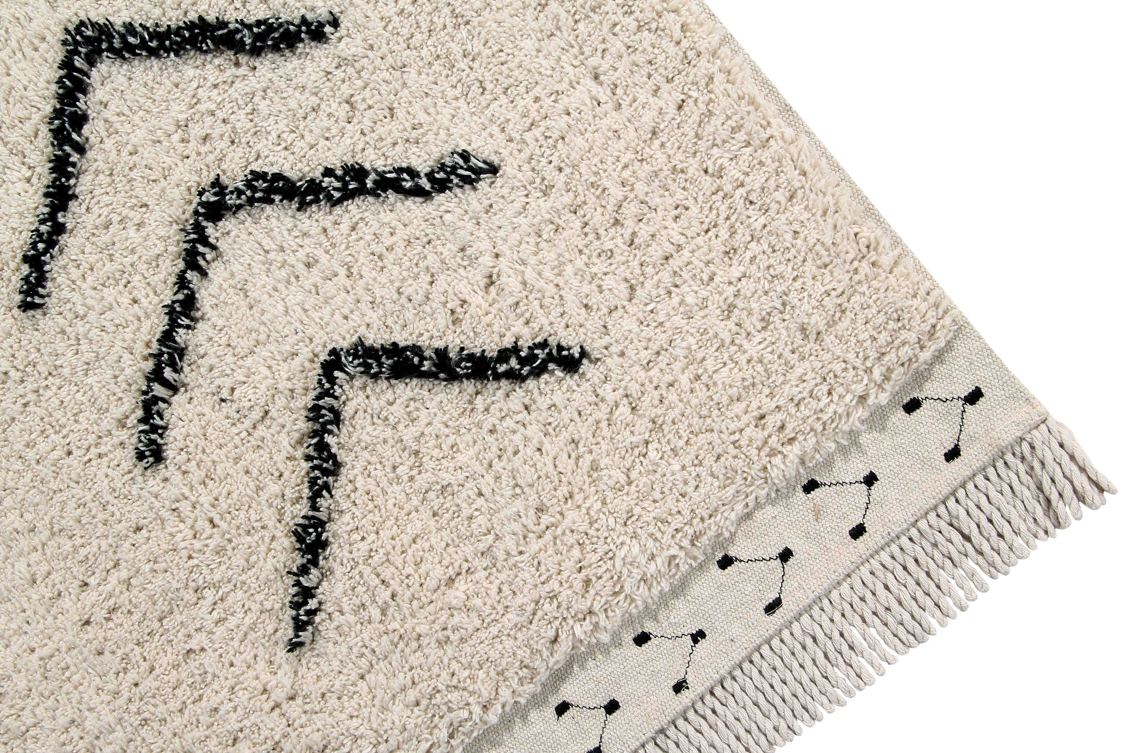 Rectangular beige cotton rug decorated with a black moroccan tribal designs