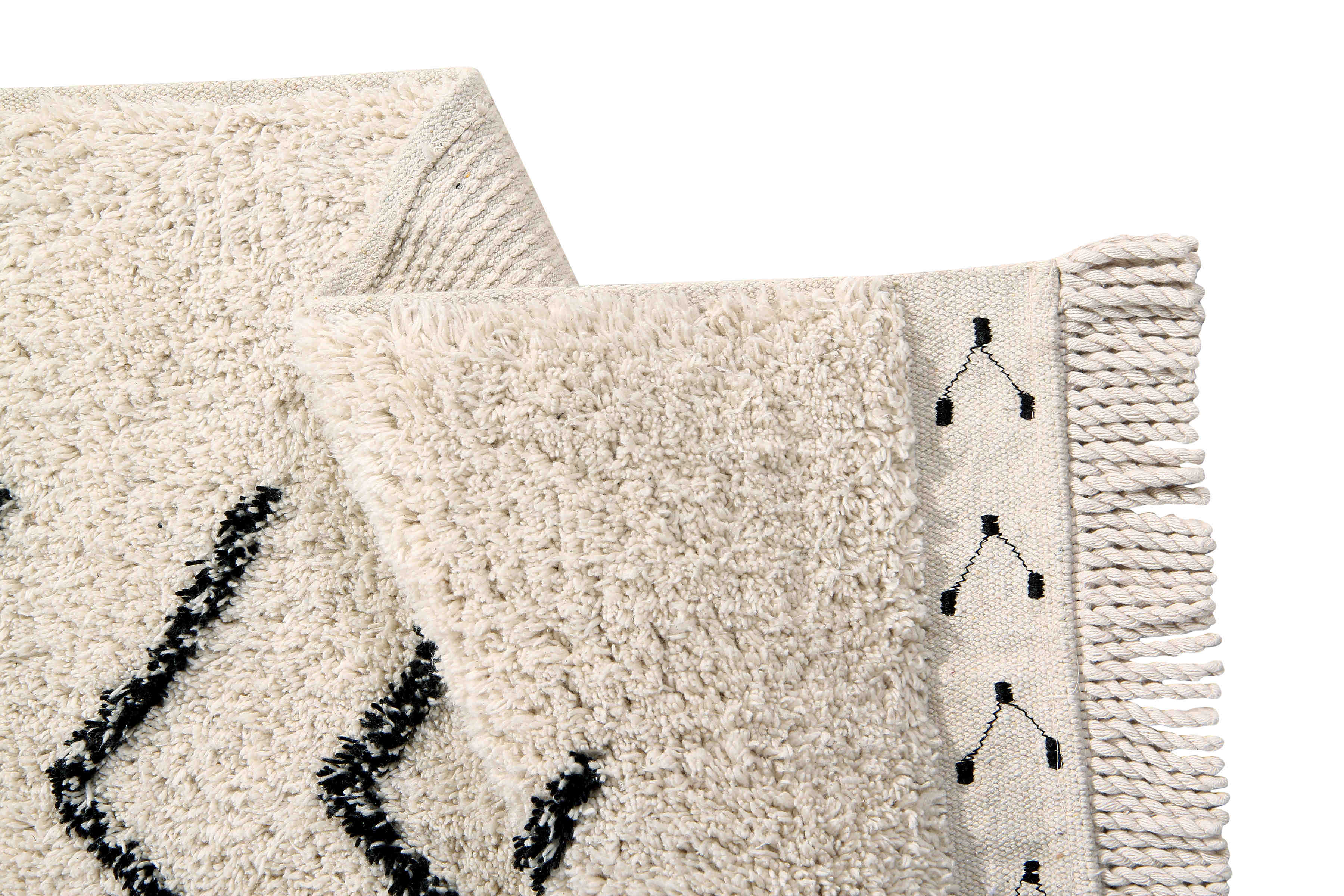 Rectangular beige cotton rug decorated with a black moroccan tribal designs