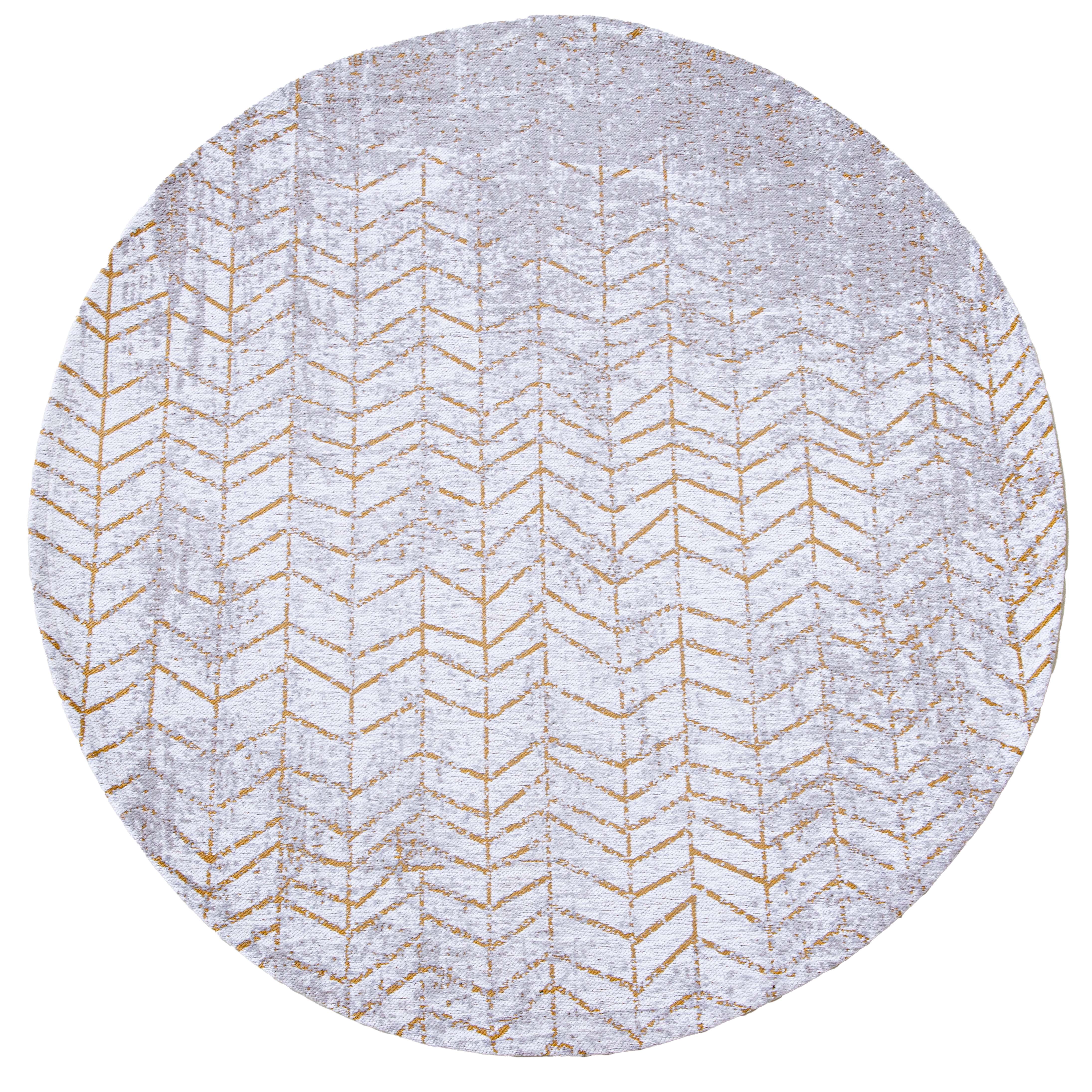 White circle flatweave rug with faded yellow chevron pattern