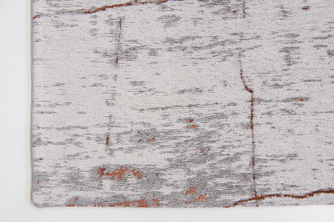 White flatweave rug with red abstract pattern