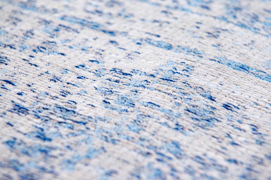 blue and grey flatweave rug with traditional medallion design