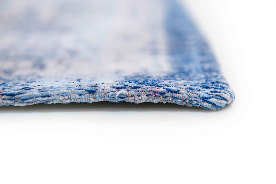 blue and grey flatweave rug with traditional medallion design