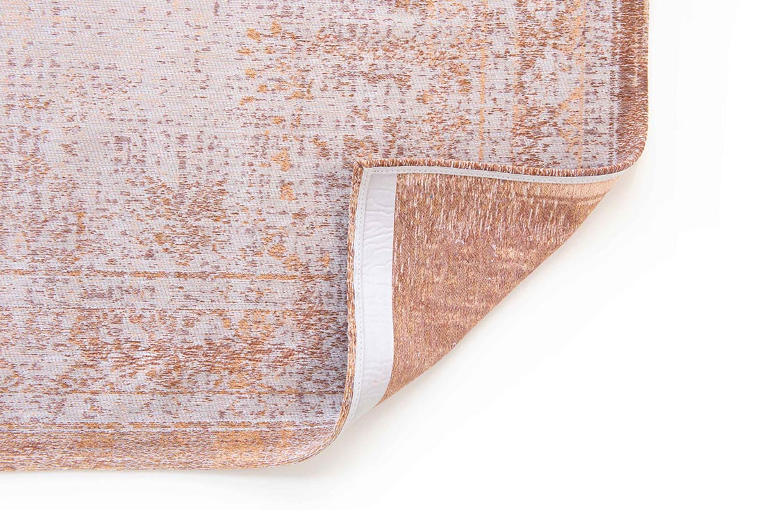 faded orange flatweave rug with traditional medallion design