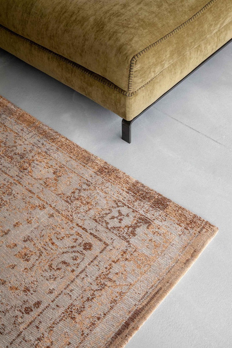 faded orange flatweave rug with traditional medallion design