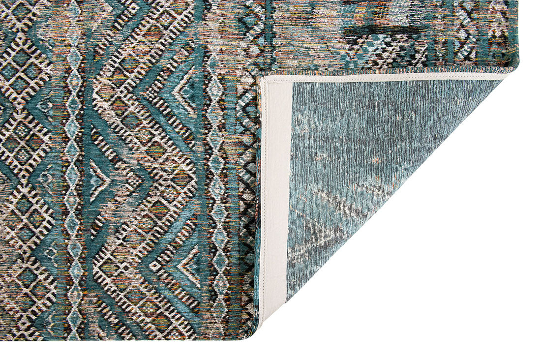 blue rug with a moroccan geometric pattern