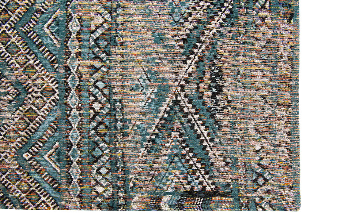 blue rug with a moroccan geometric pattern
