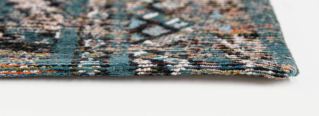 blue rug with a moroccan geometric pattern