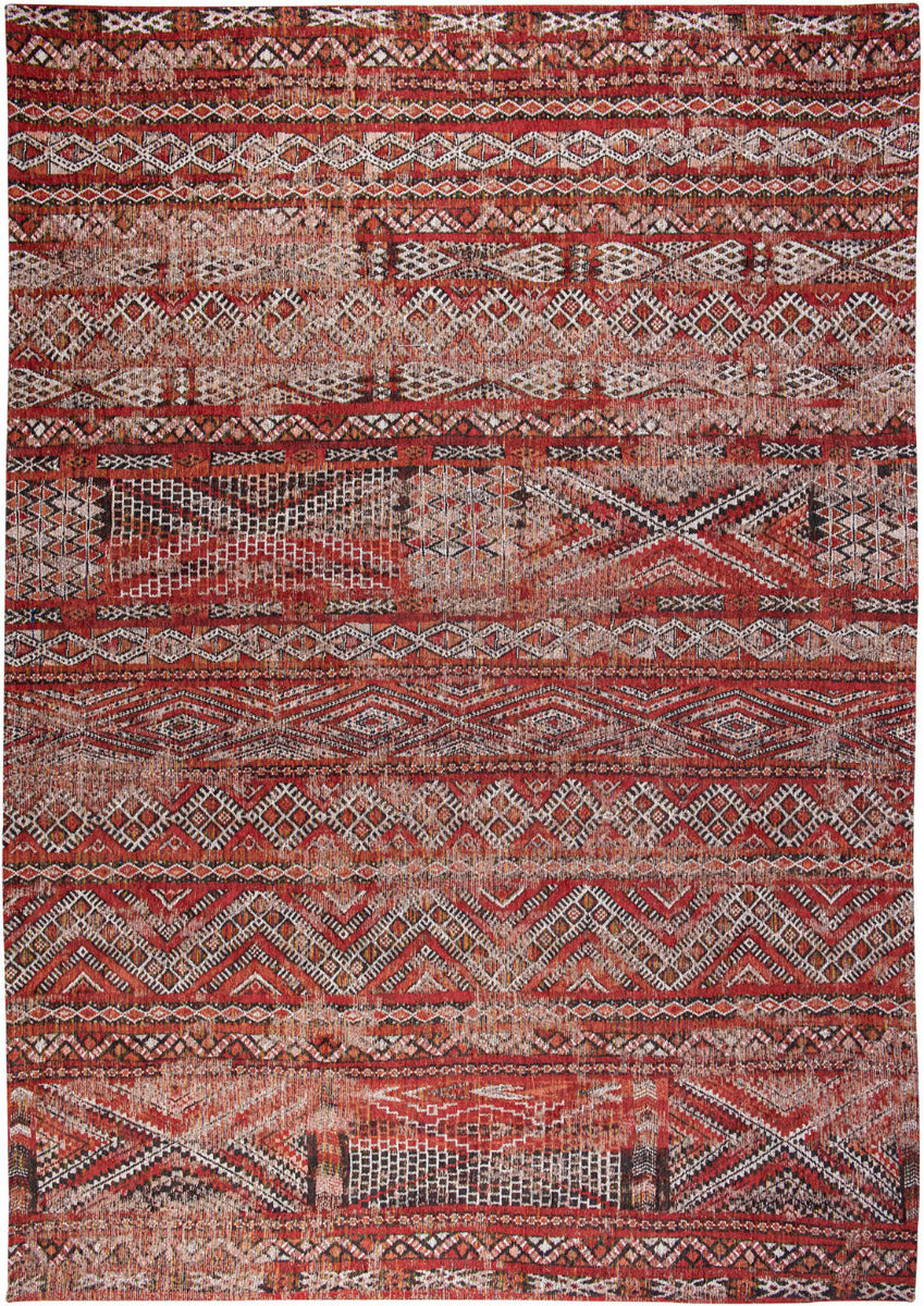 red rug with a moroccan geometric pattern