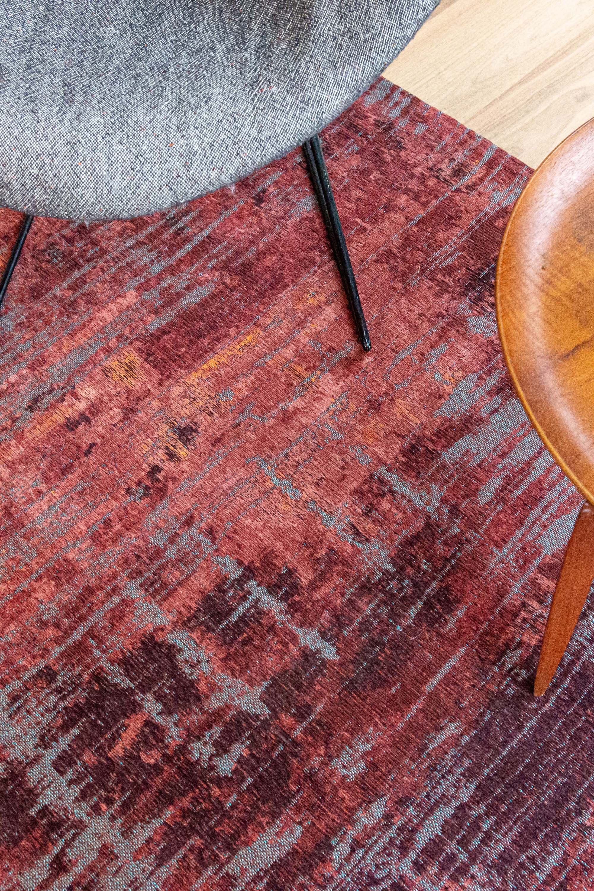 red, orange and blue abstract rug