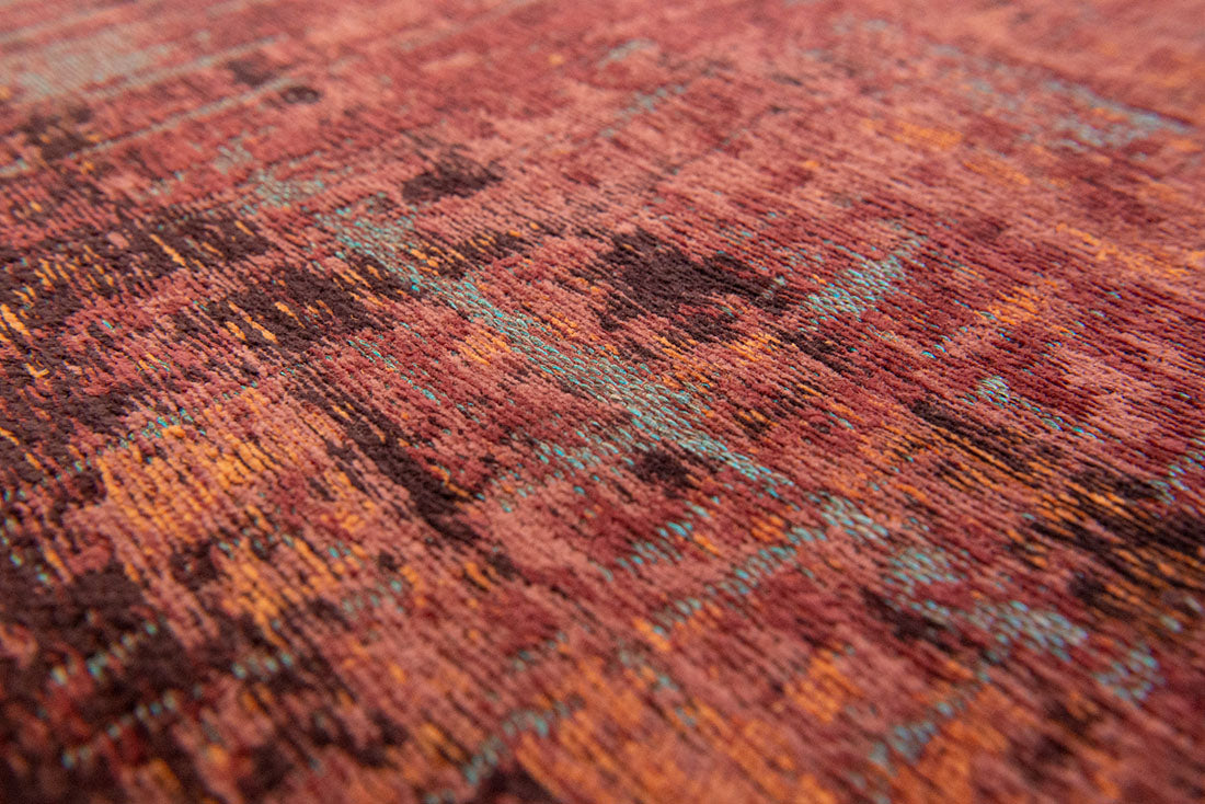 red, orange and blue abstract rug