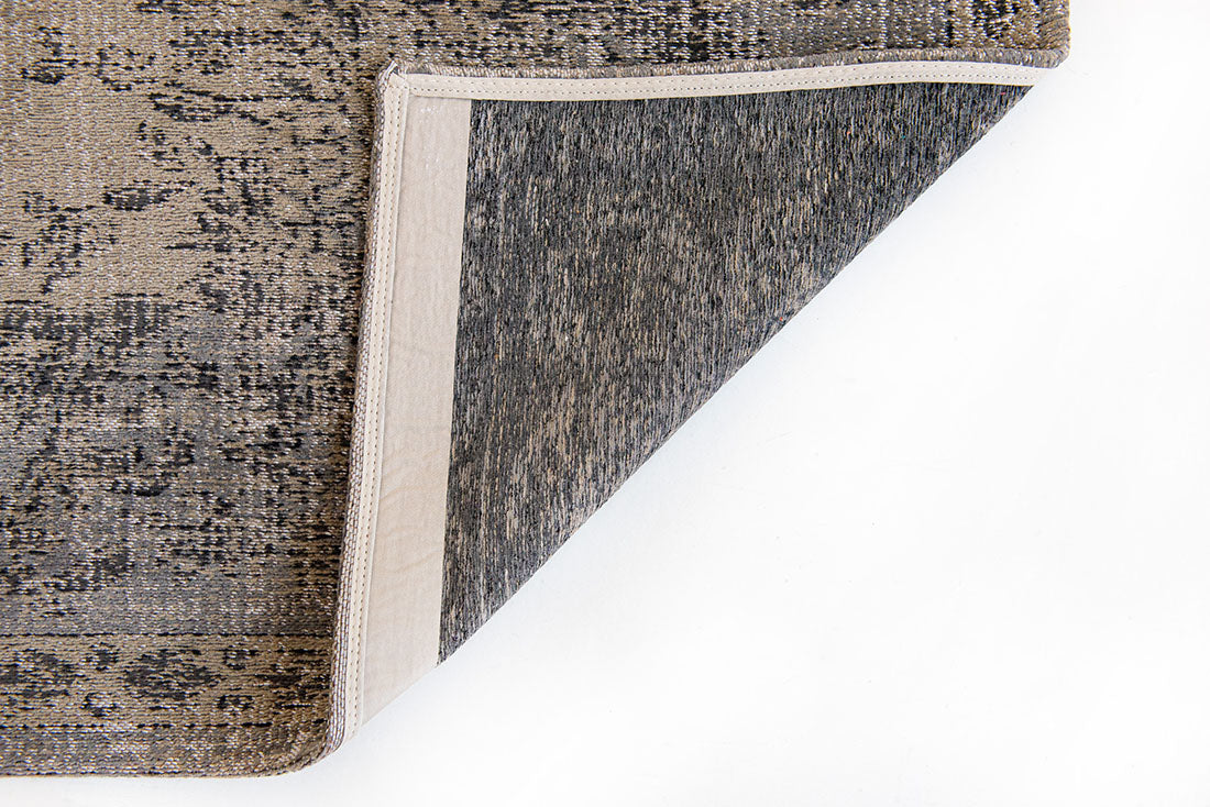 taupe brown vintage style rug with a traditional design