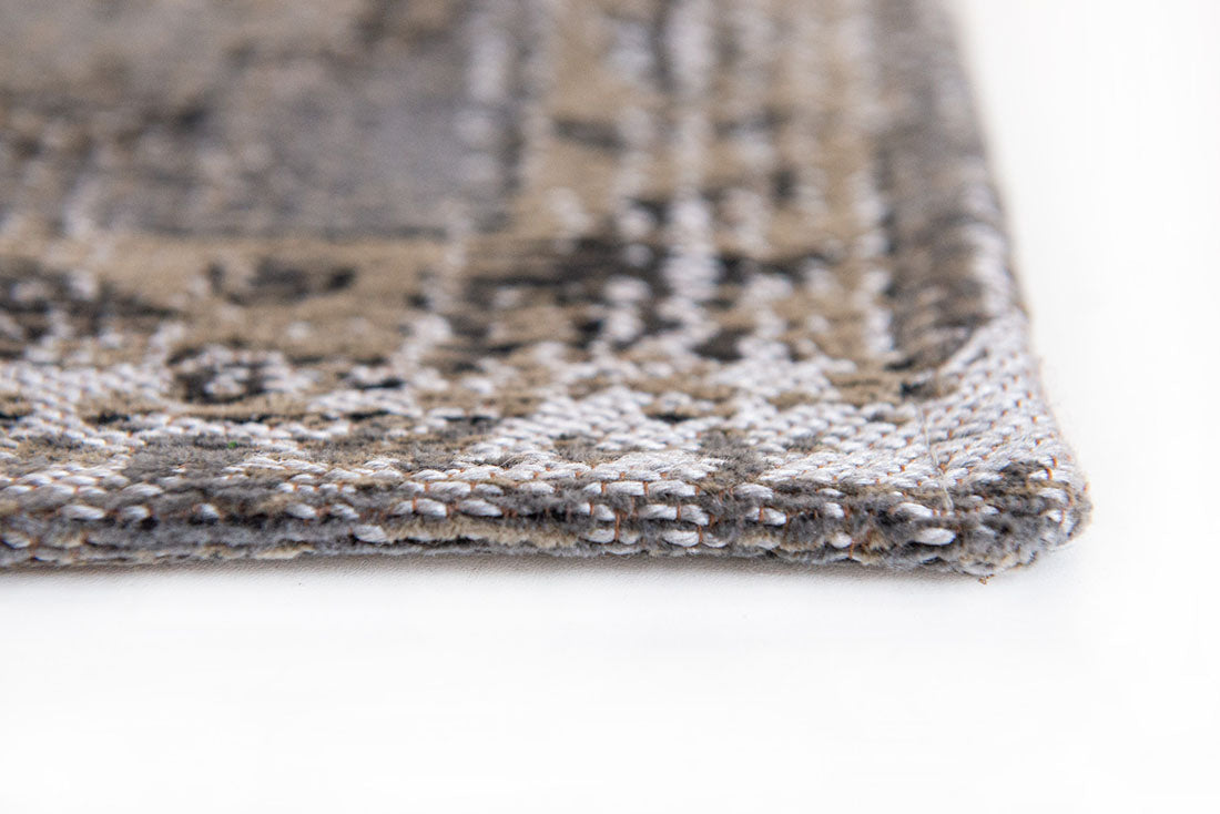 taupe brown vintage style rug with a traditional design