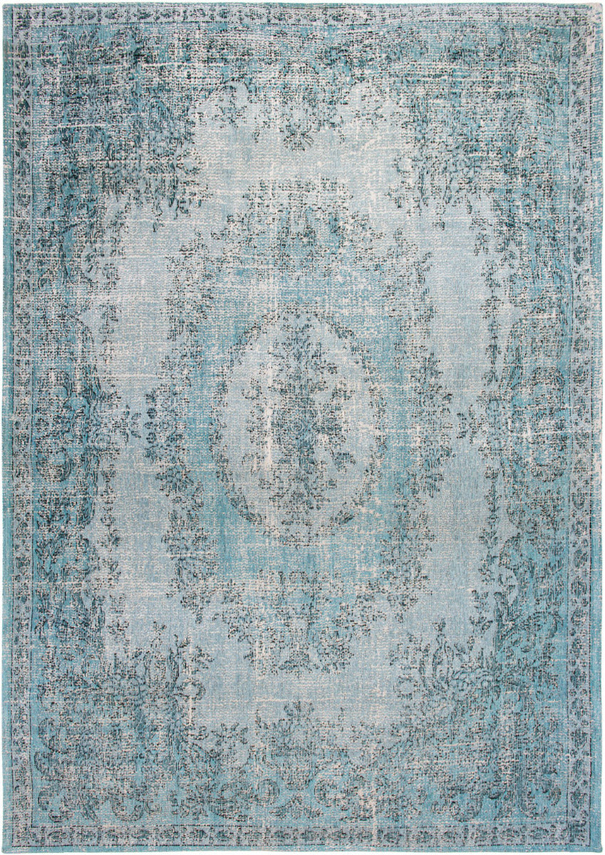 blue vintage style rug with a traditional design