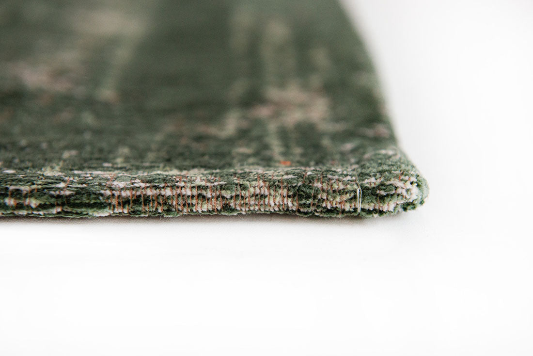 green vintage style rug