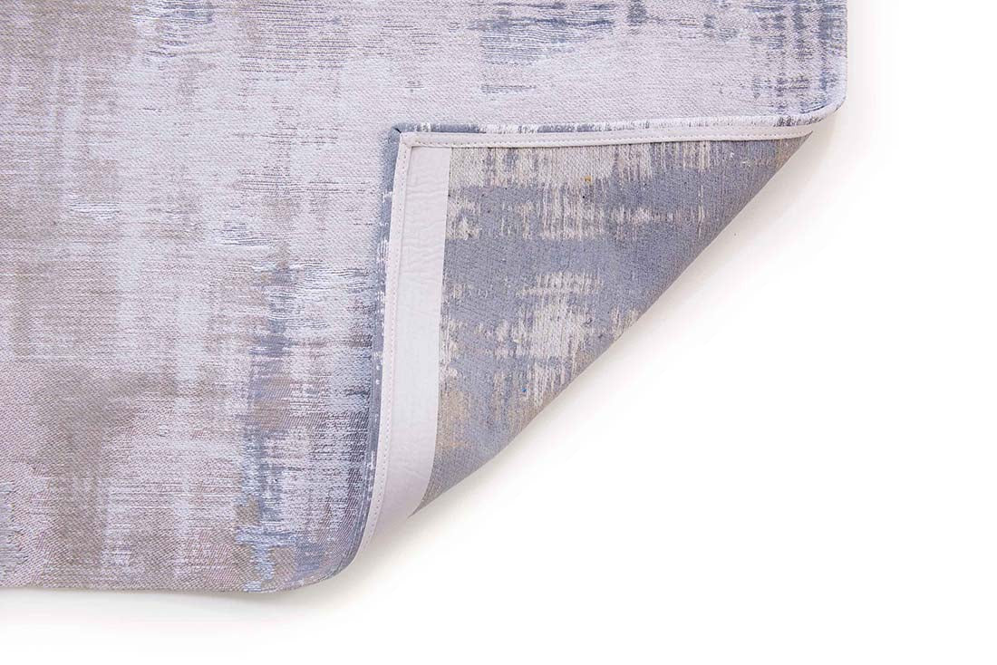 beige flatweave rug with modern abstract design