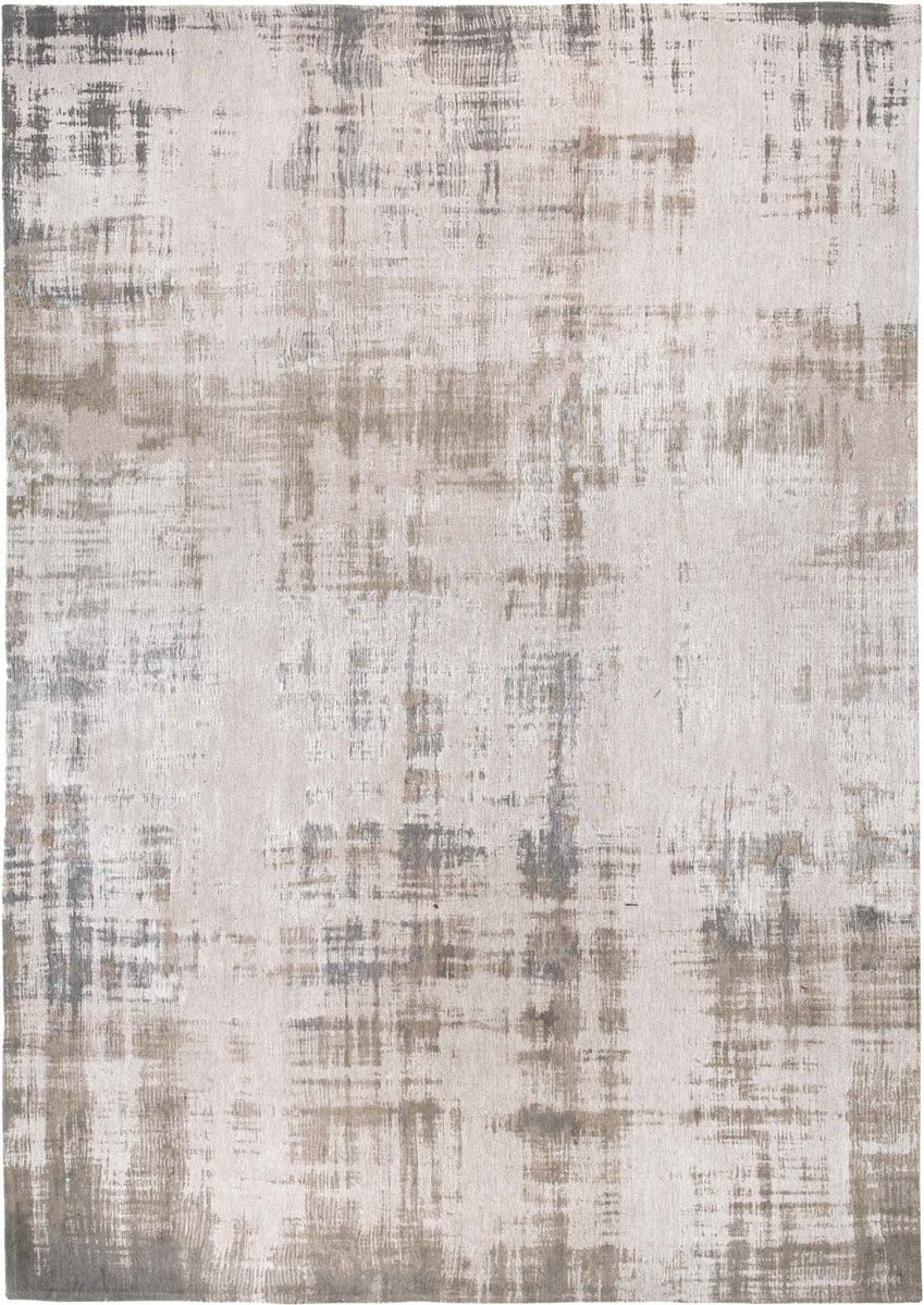 beige flatweave rug with modern abstract design