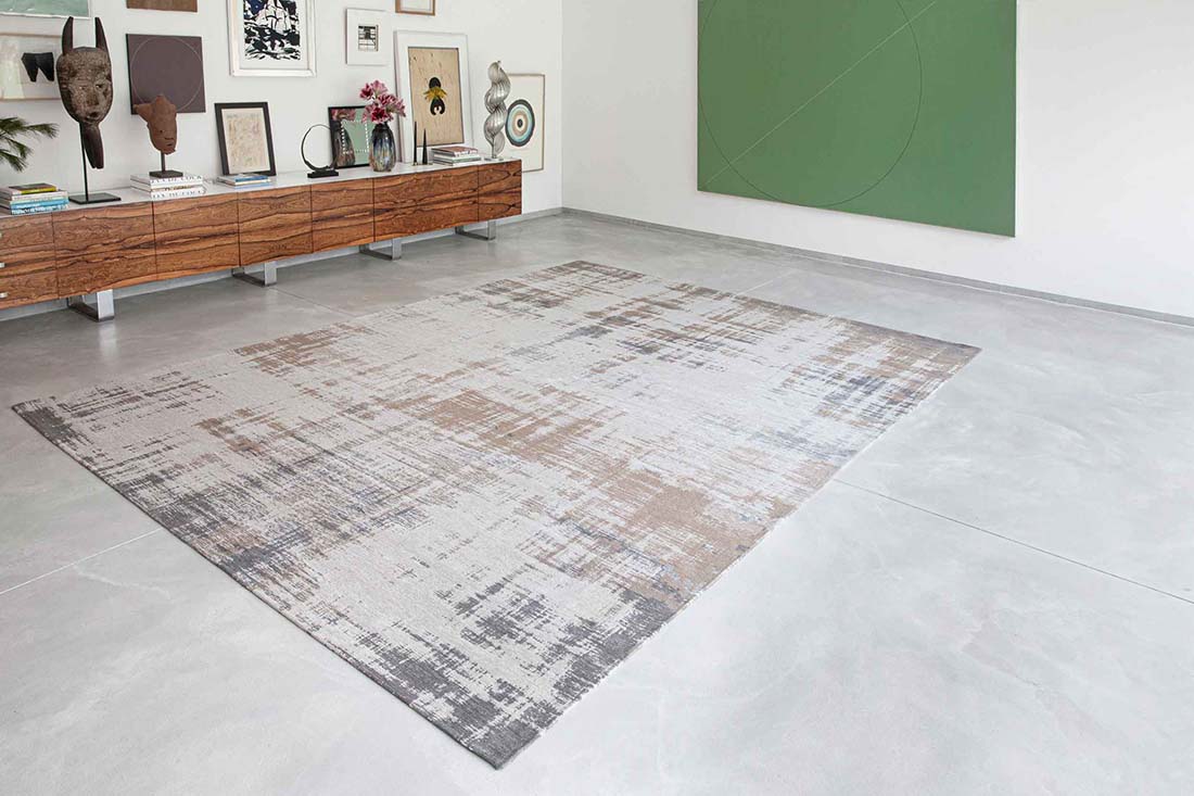beige flatweave rug with modern abstract design