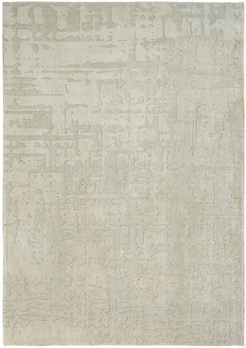 beige flatweave area rug with subtle, organic pattern