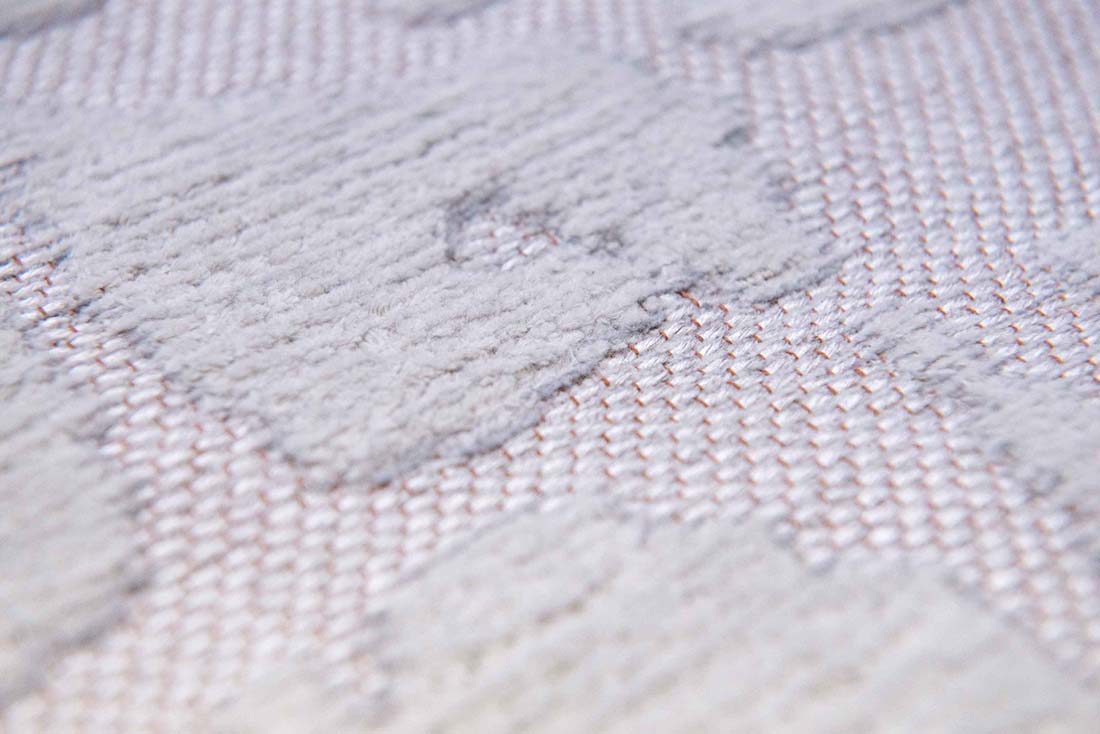 cream flatweave area rug with subtle