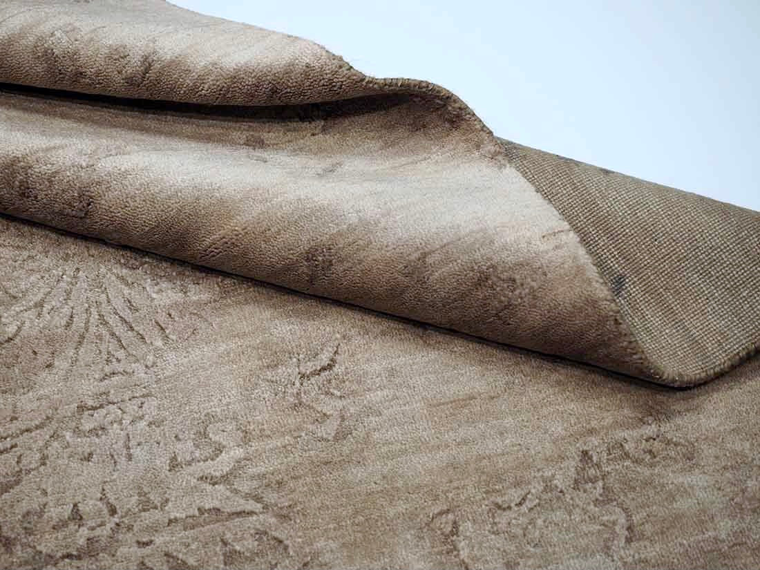 Authentic oriental rug with a damask pattern in beige