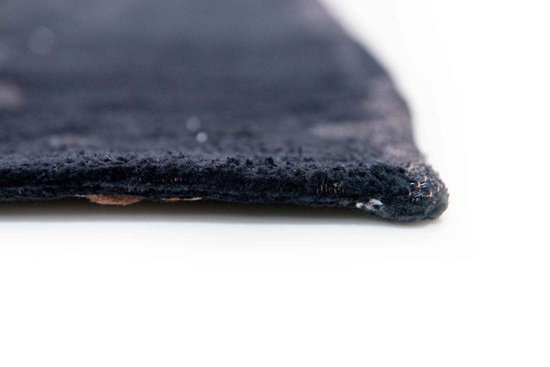 black flatweave area rug with subtle