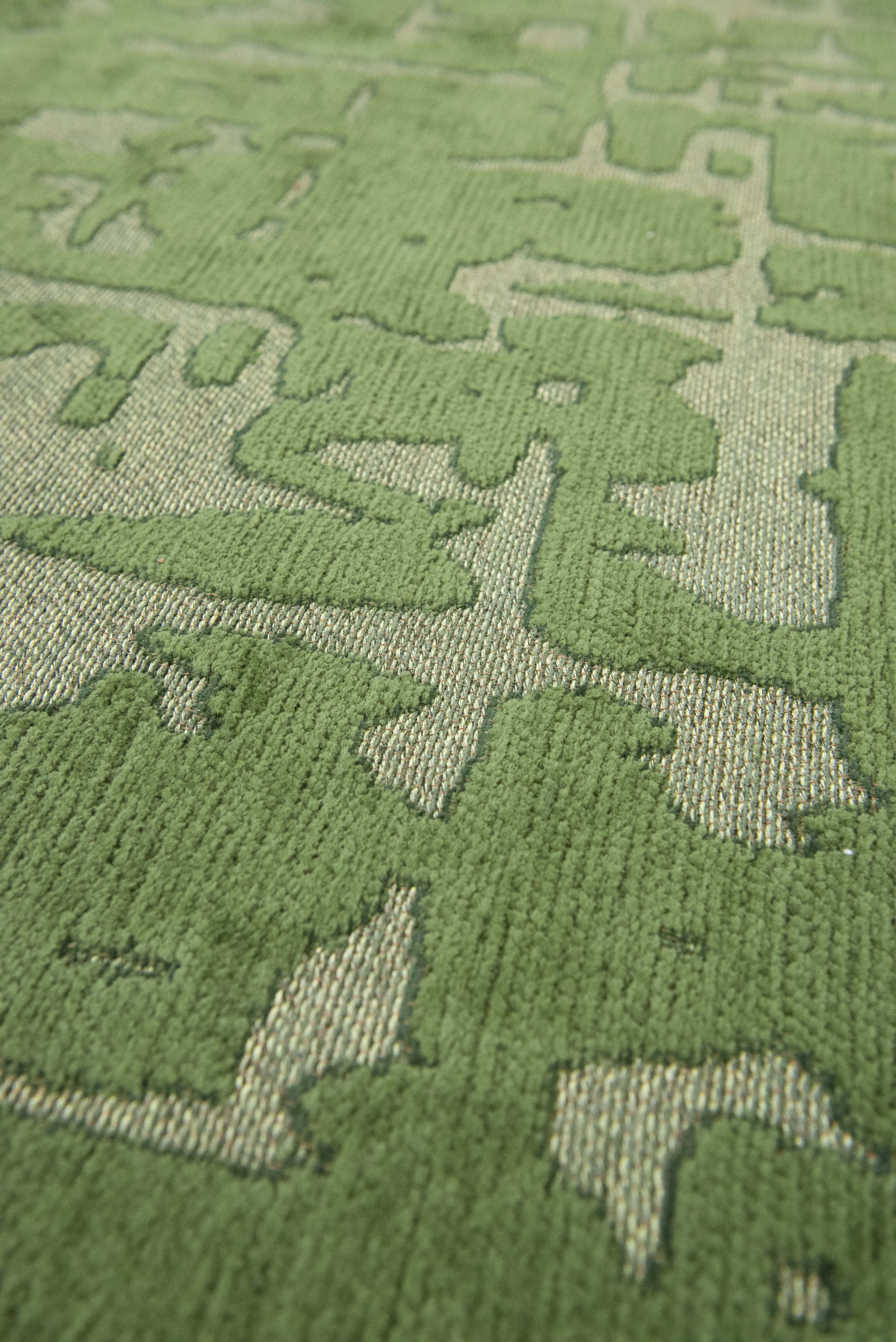 Green flatweave area runner rug with subtle, organic pattern