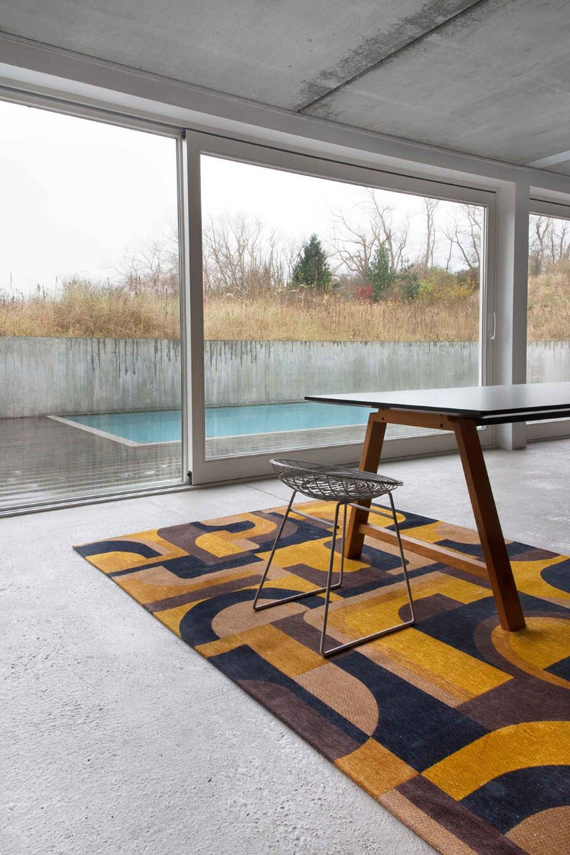 flatweave area rug with retro pattern in yellow