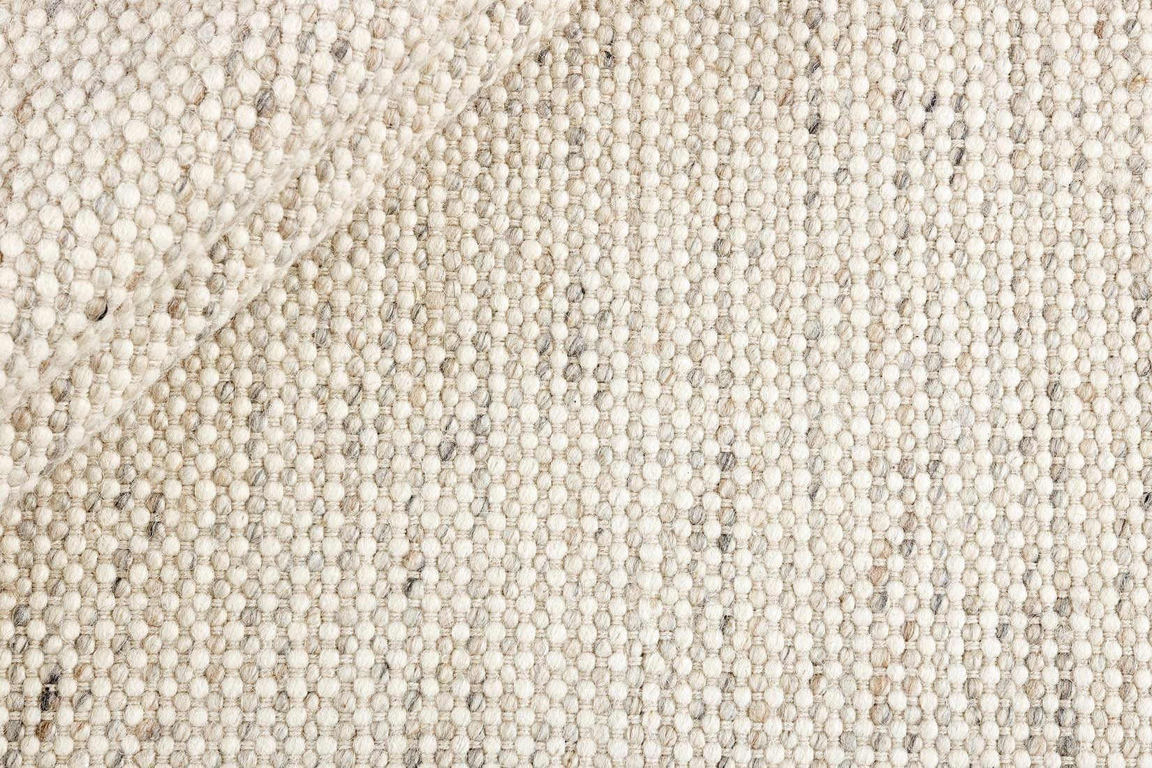 Grey textured area rug