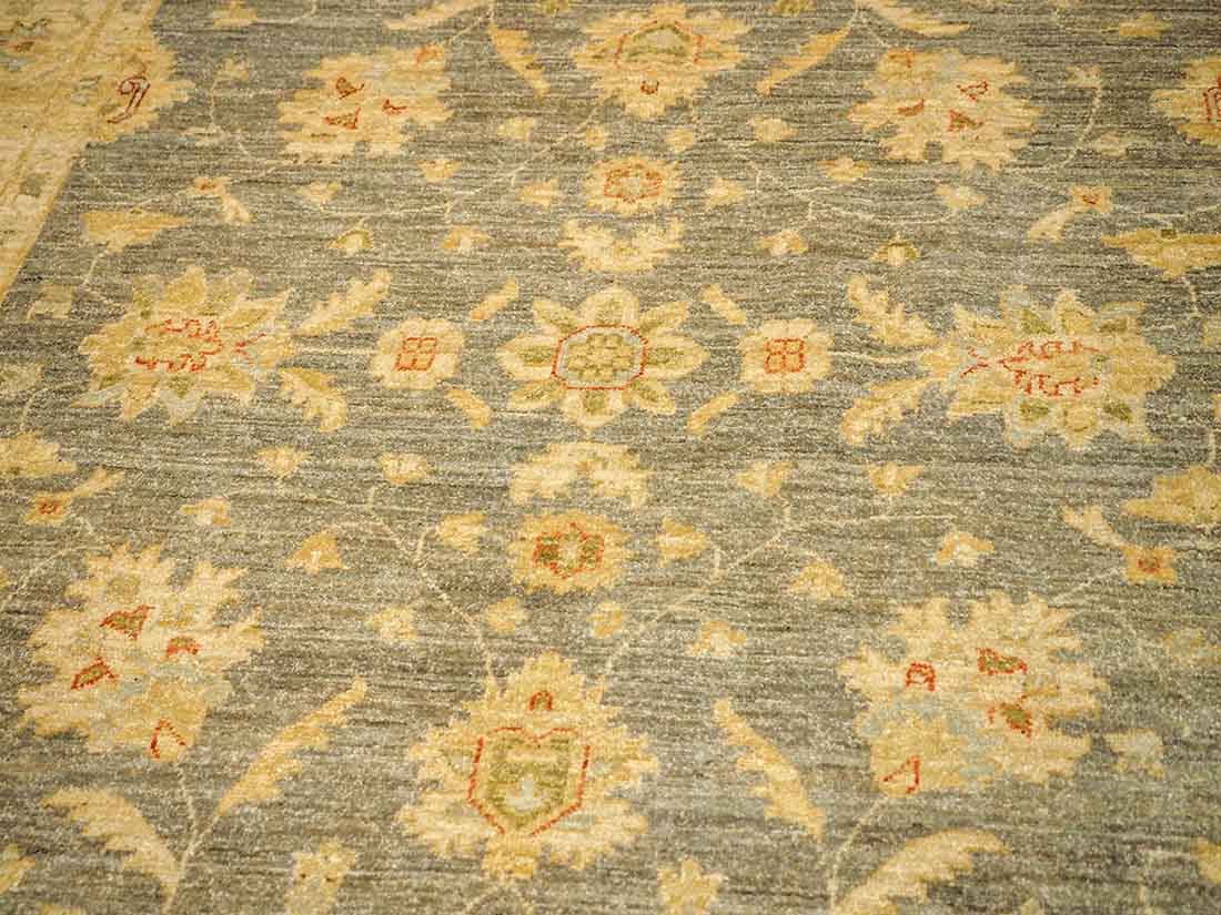 Authentic oriental rug with delicate floral pattern in beige