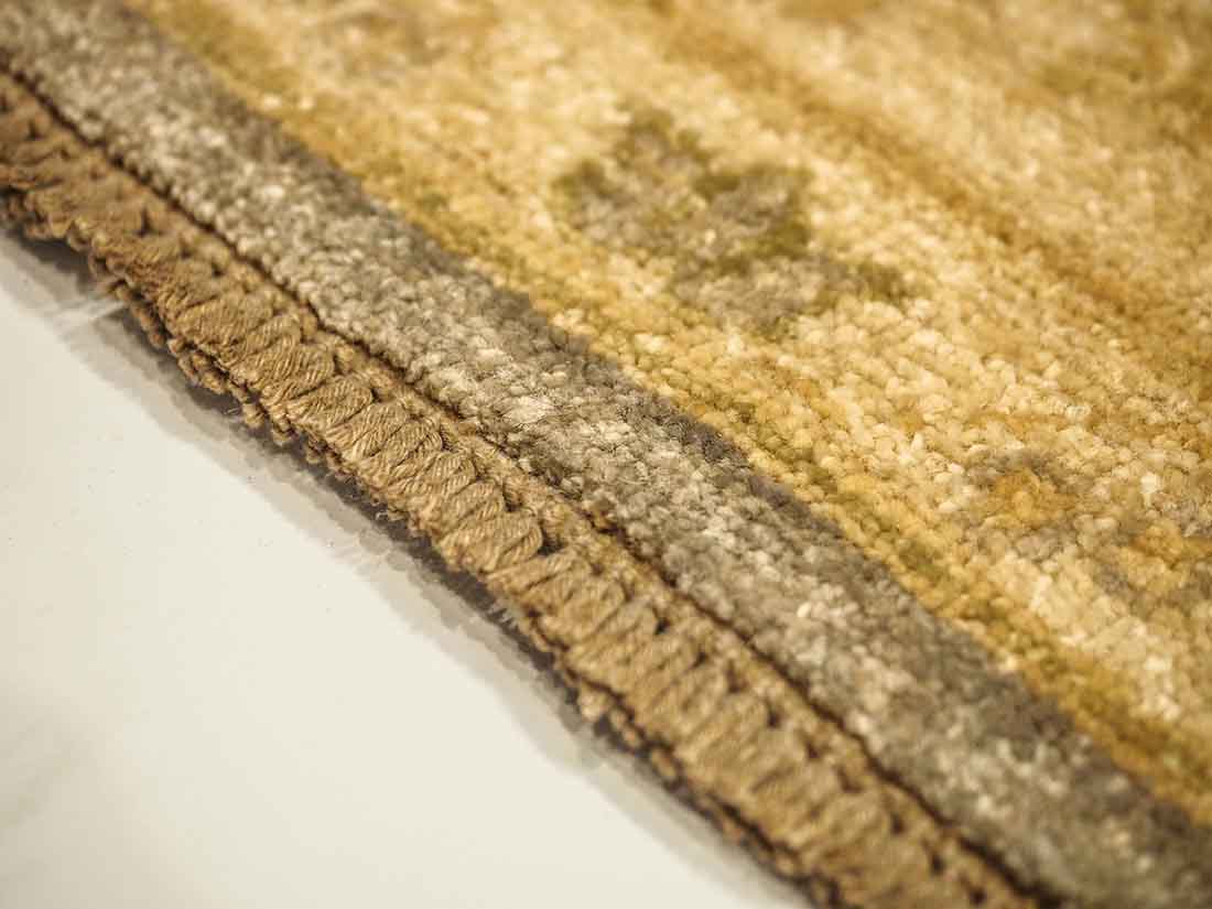 Authentic oriental rug with delicate floral pattern in beige