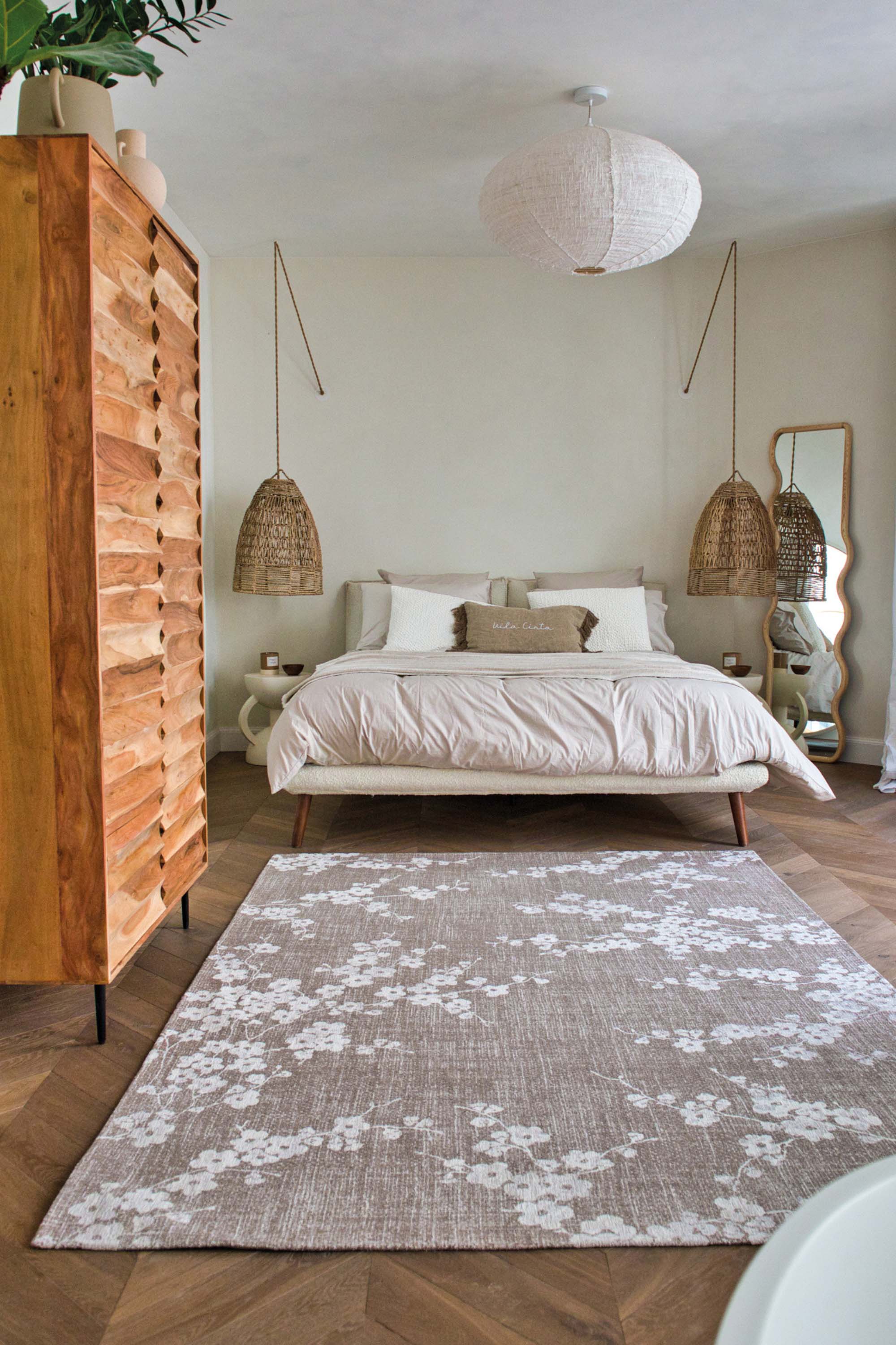 Modern abstract rug with subtle beige floral pattern