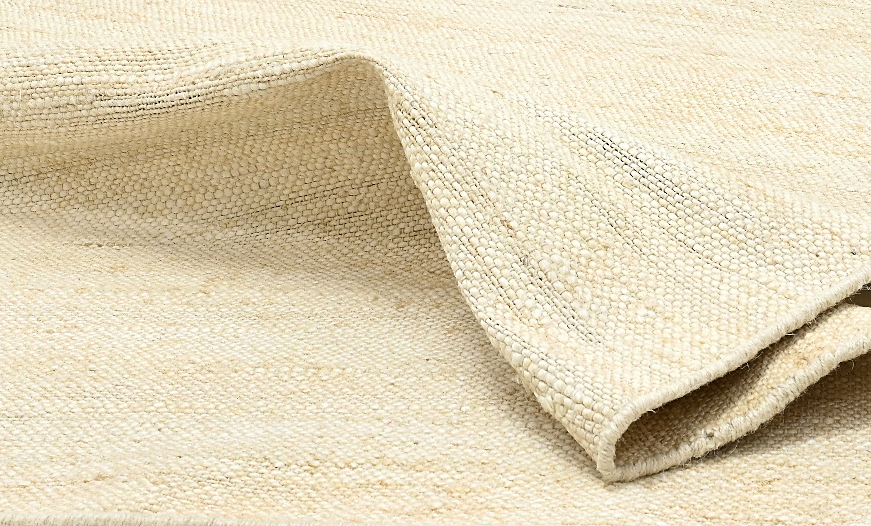 Neutral handwoven jute rug