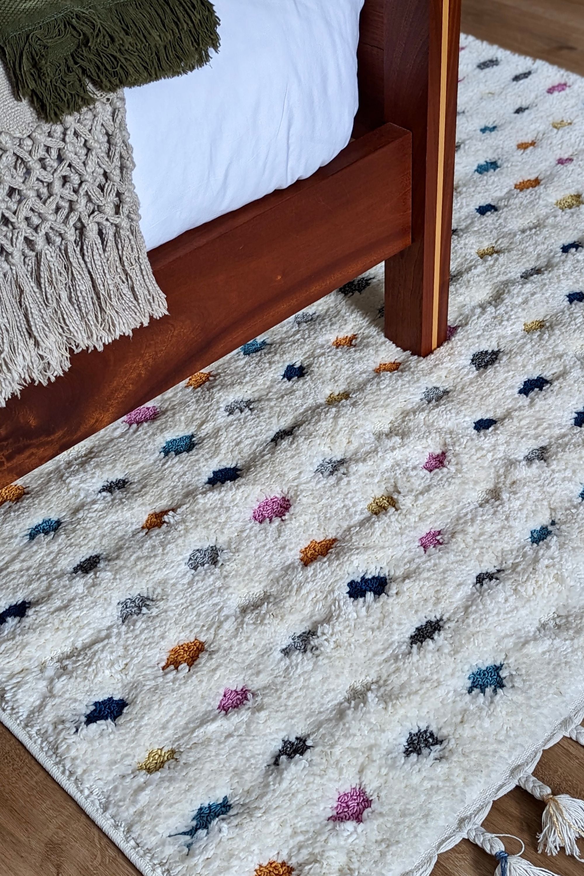 Textured cream rug with multicolour dot design