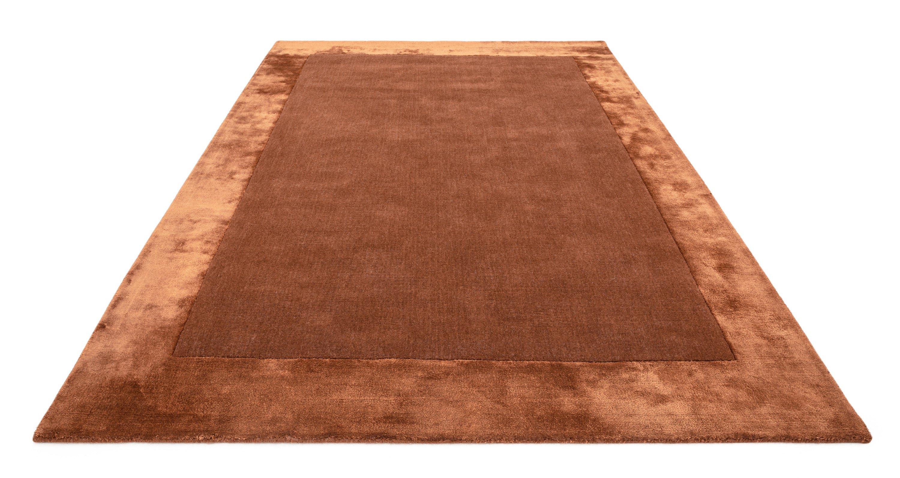Orange wool and viscose rug with a border design