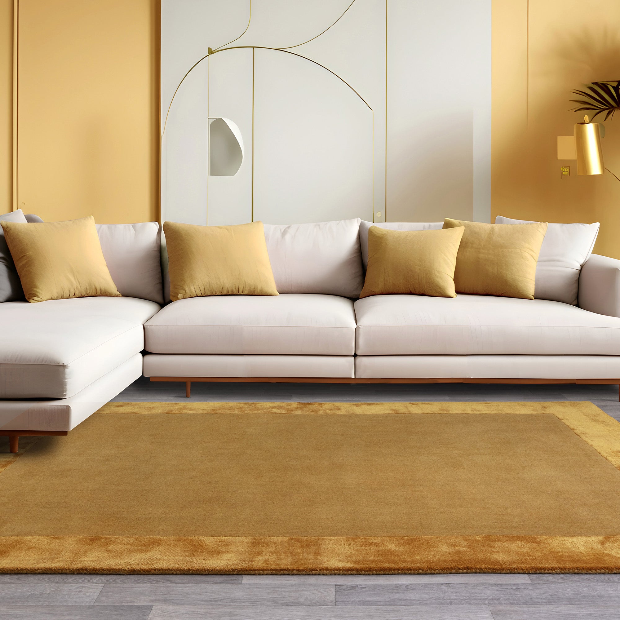 Gold wool and viscose rug with a border design