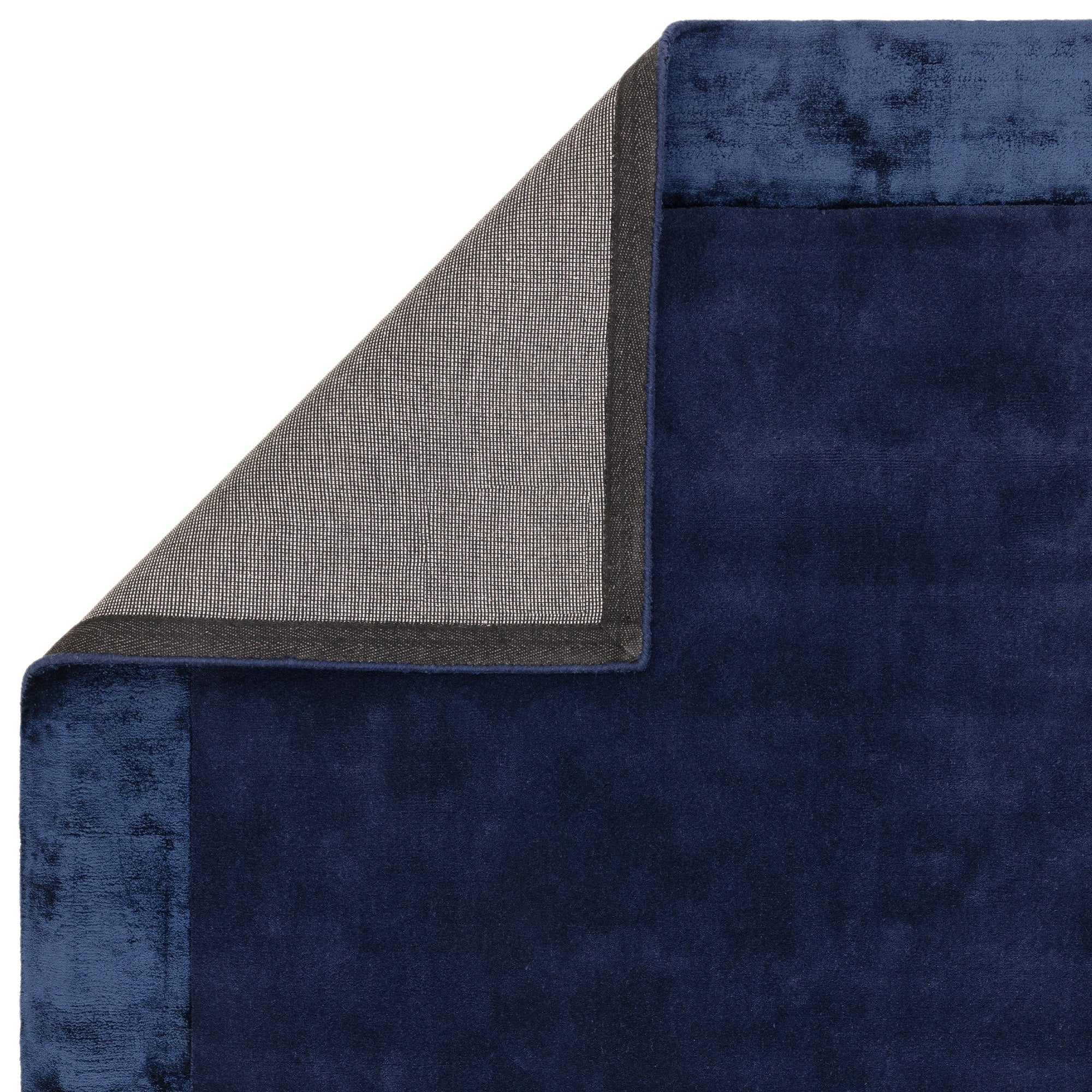 Navy wool and viscose rug with a border design