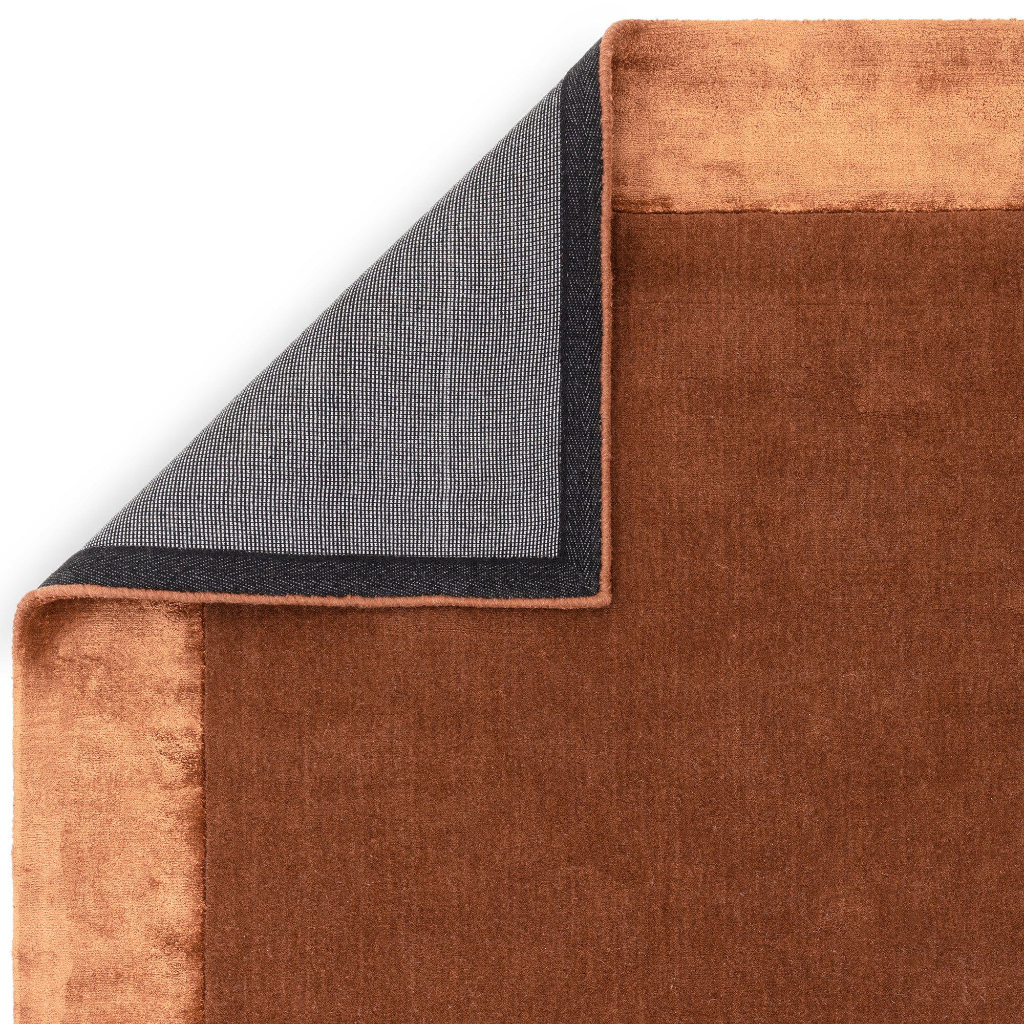 Orange wool and viscose rug with a border design