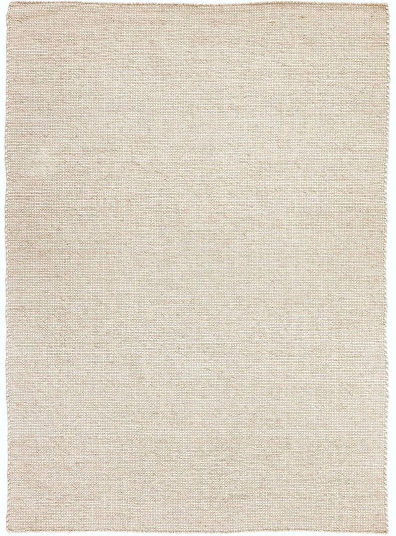 Simple beige textured area rug
