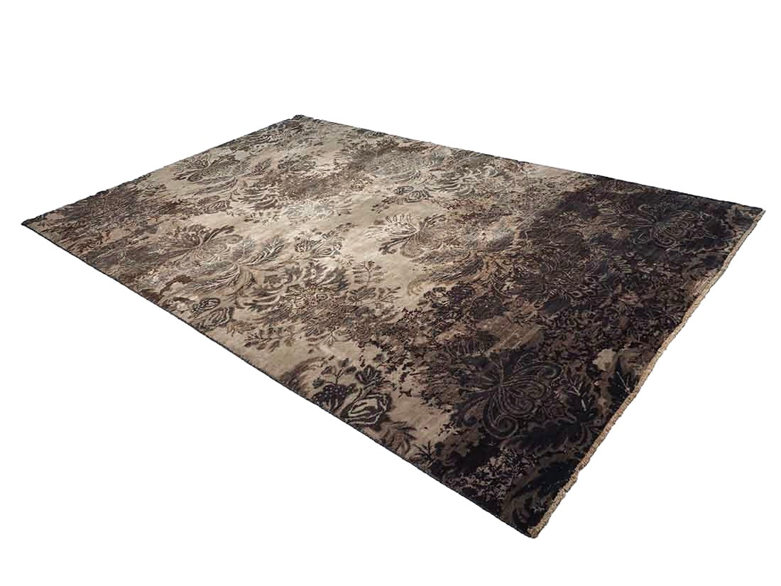 Authentic oriental rug with a damask pattern in beige and brown
