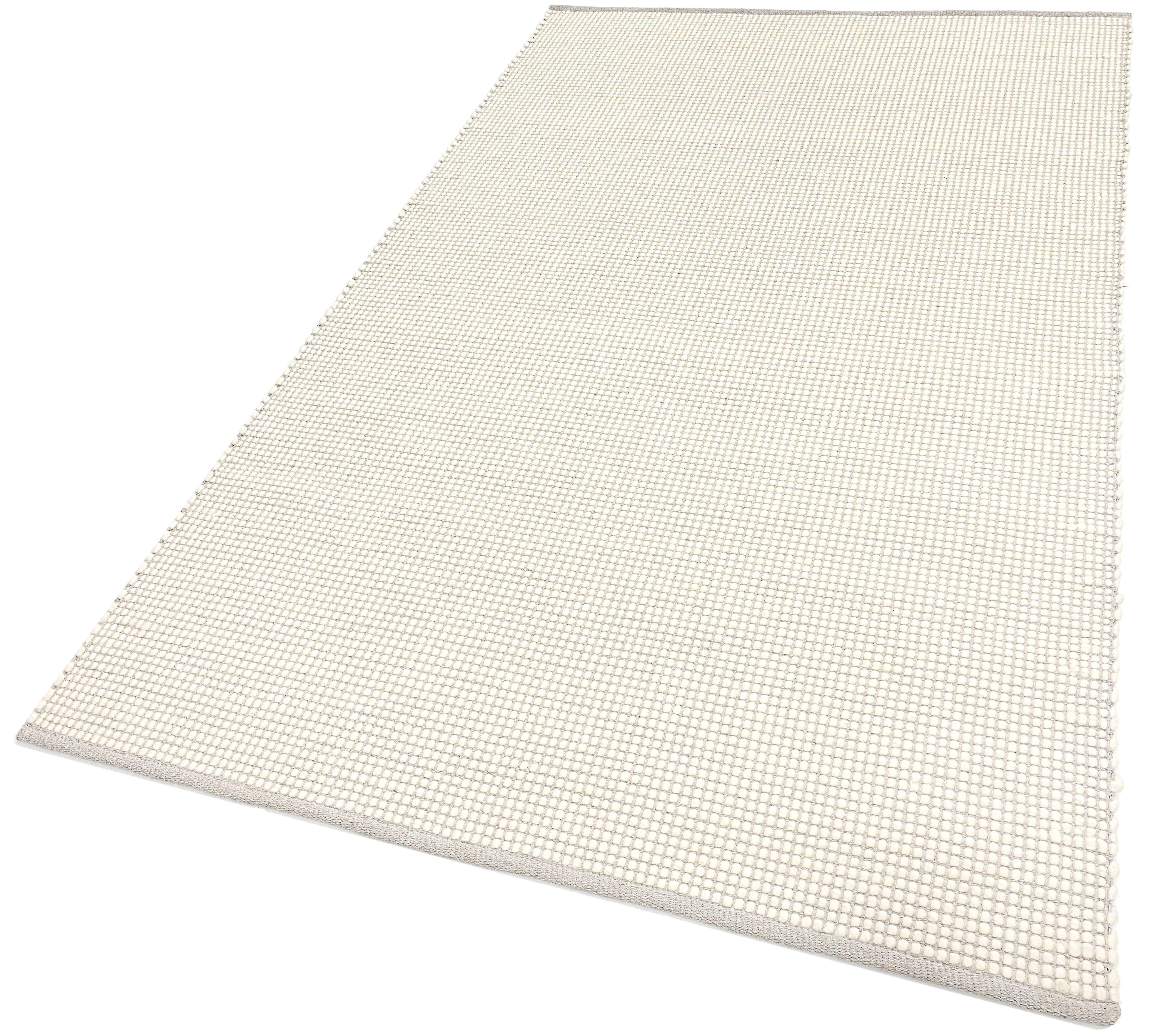 Textured wool white area rug
