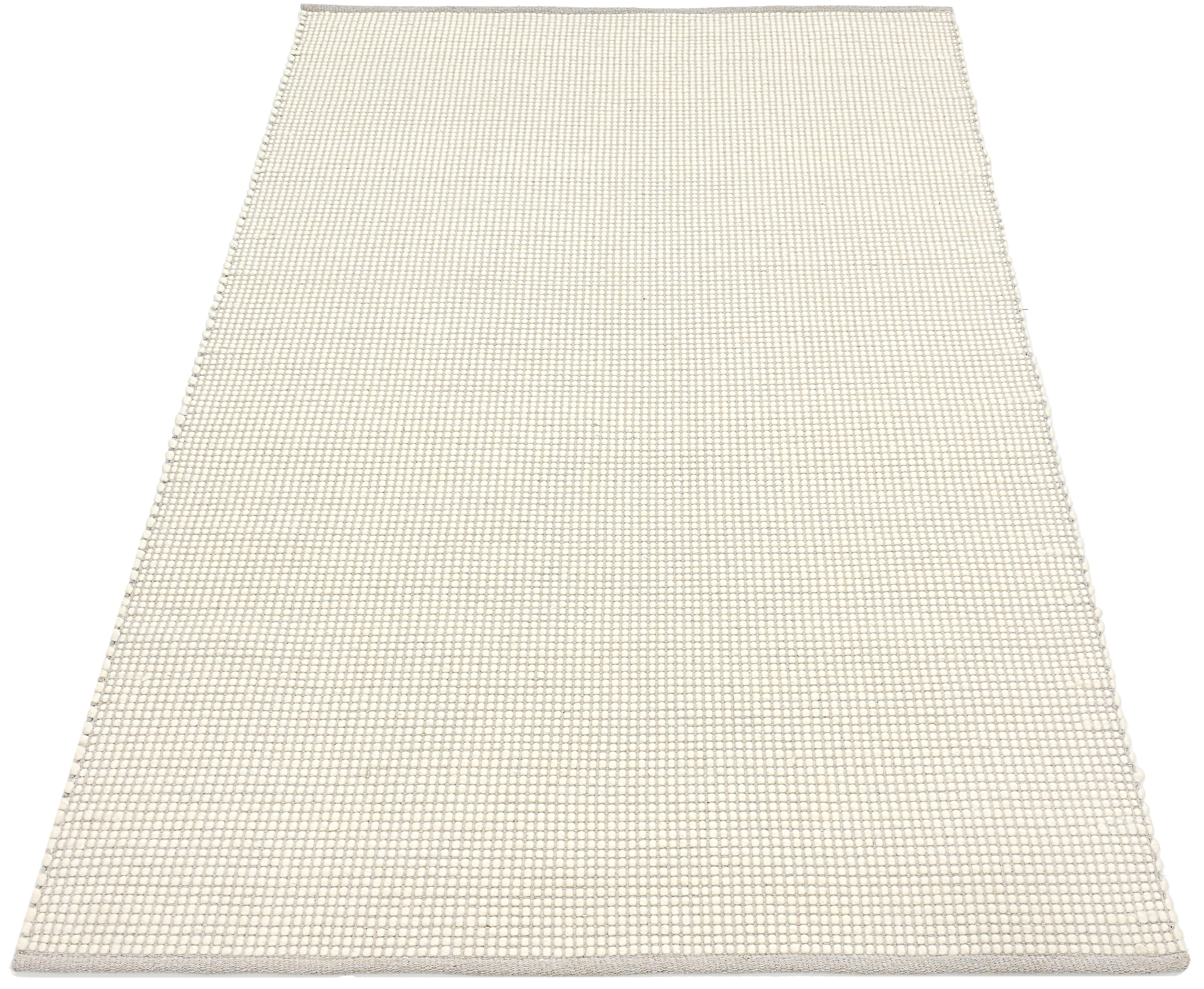 Textured wool white area rug