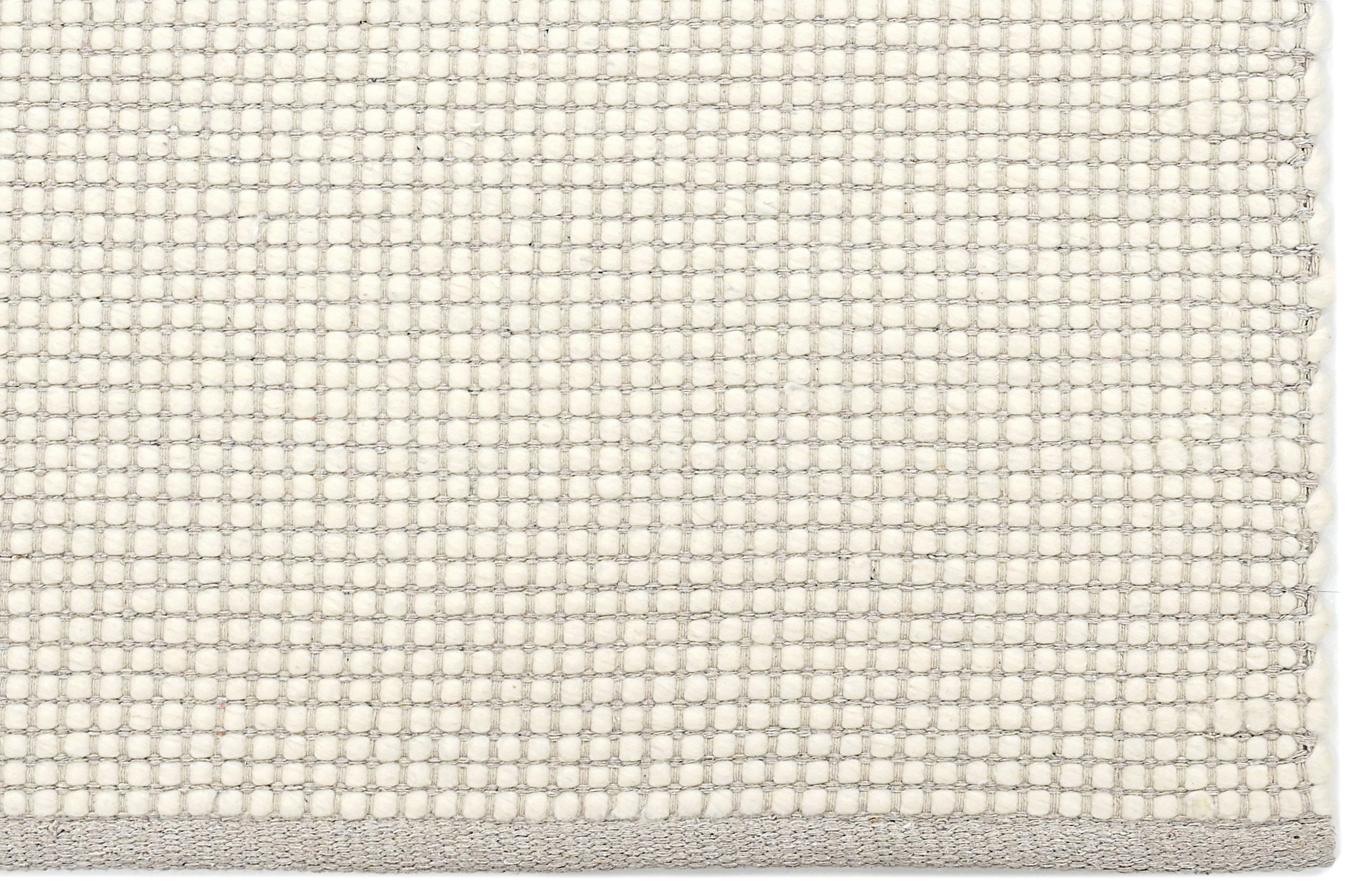 Textured wool white area rug