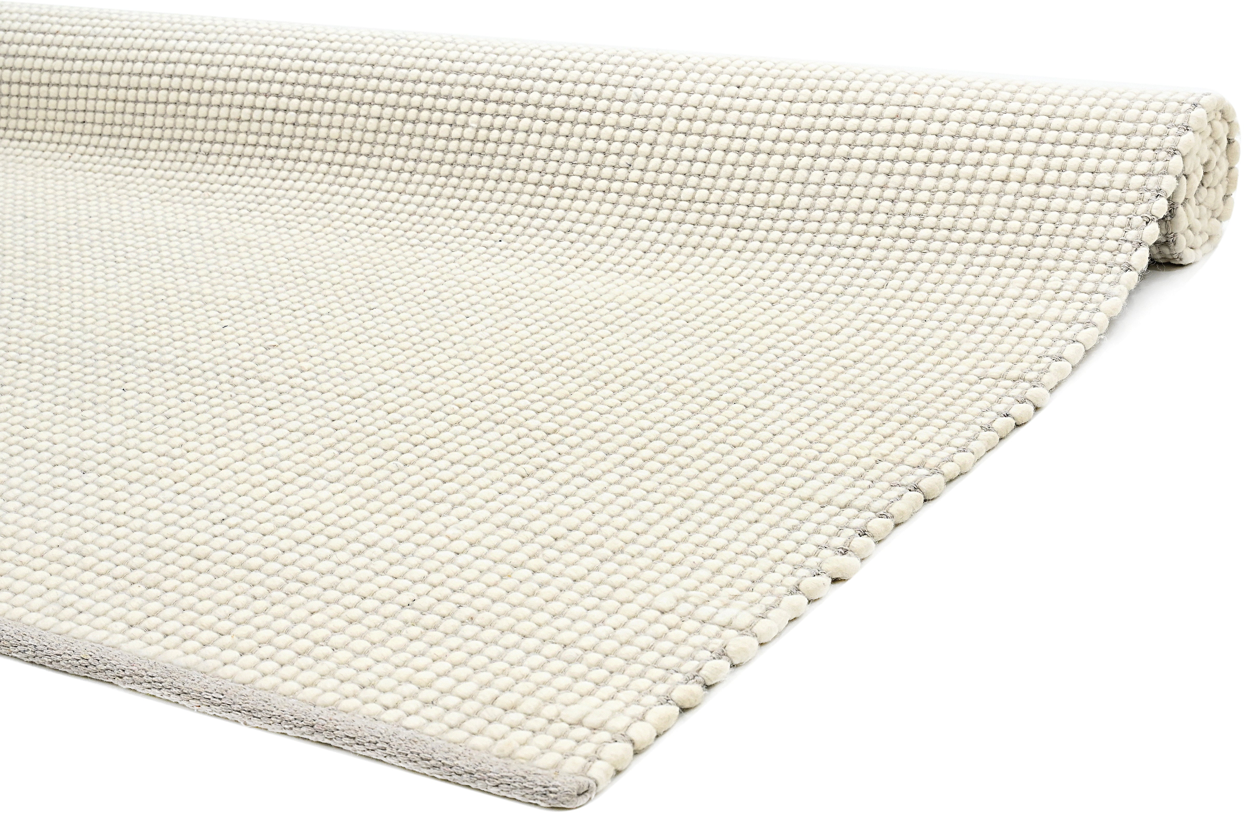 Textured wool white area rug