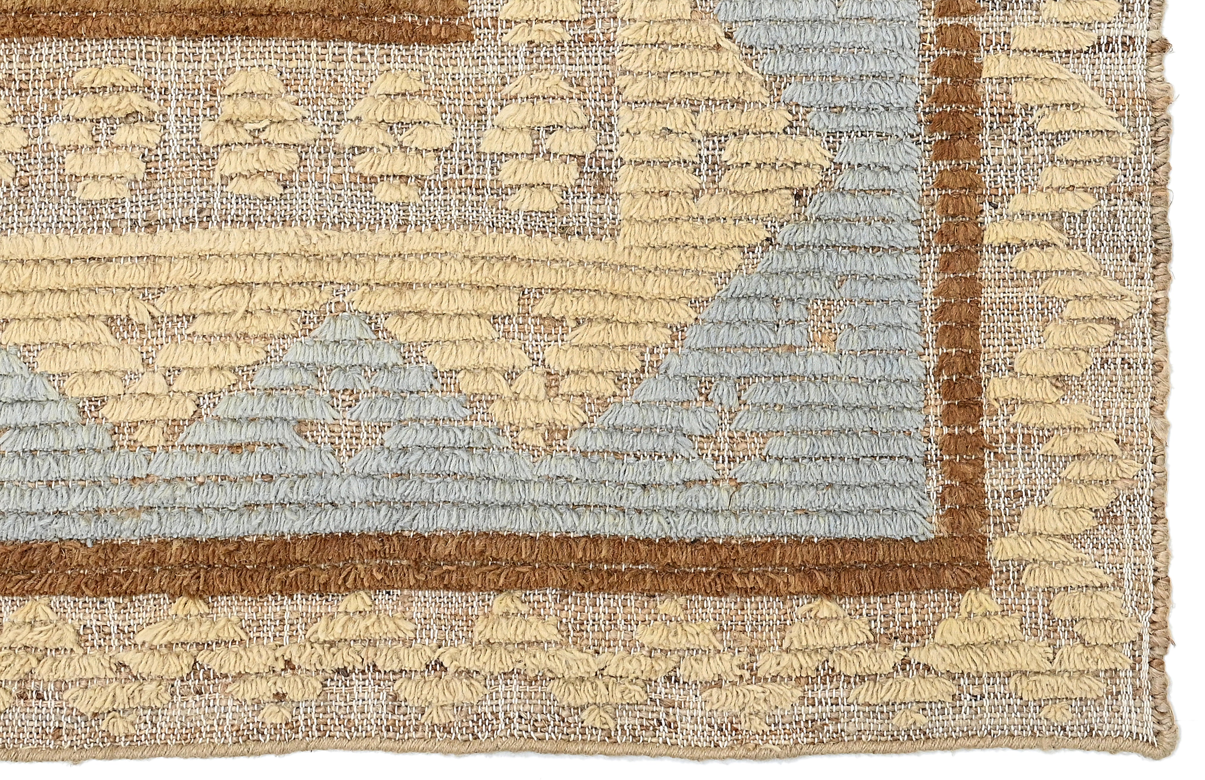 Blue and yellow jute rug with geometric pattern