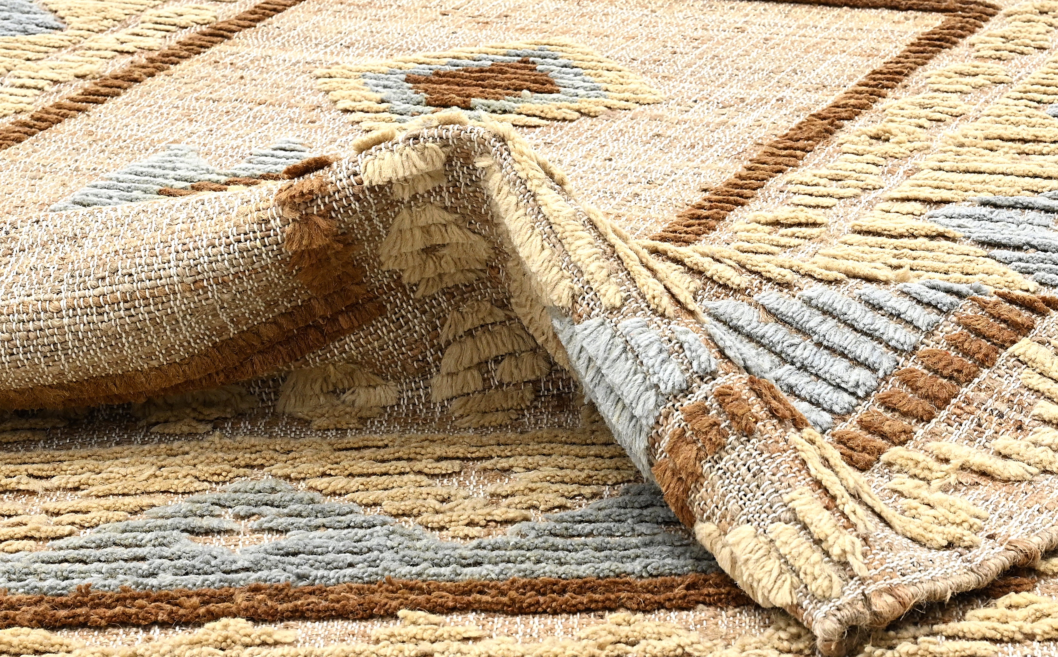 Blue and yellow jute rug with geometric pattern