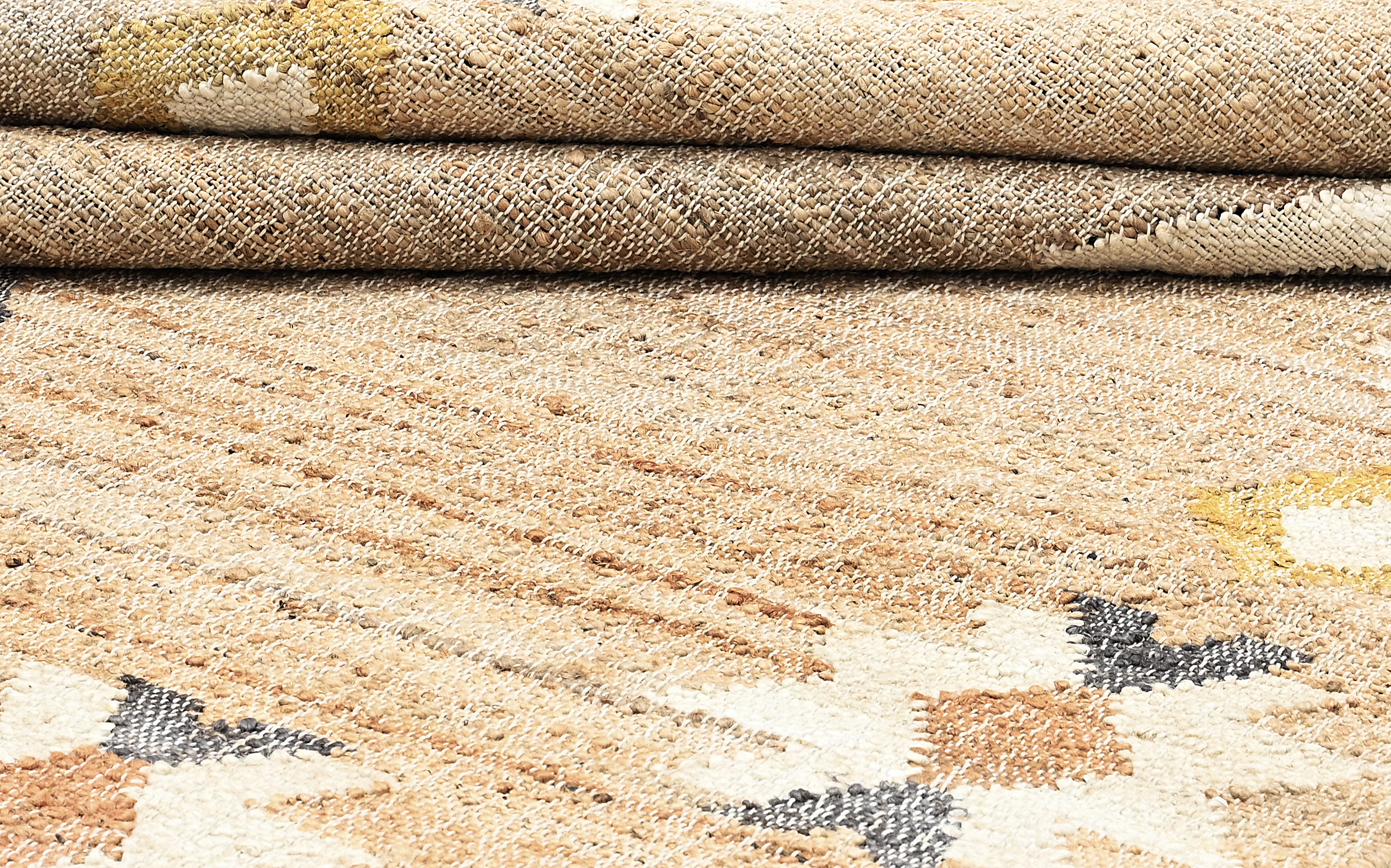 Jute rug with yellow, grey and terracotta geometric pattern