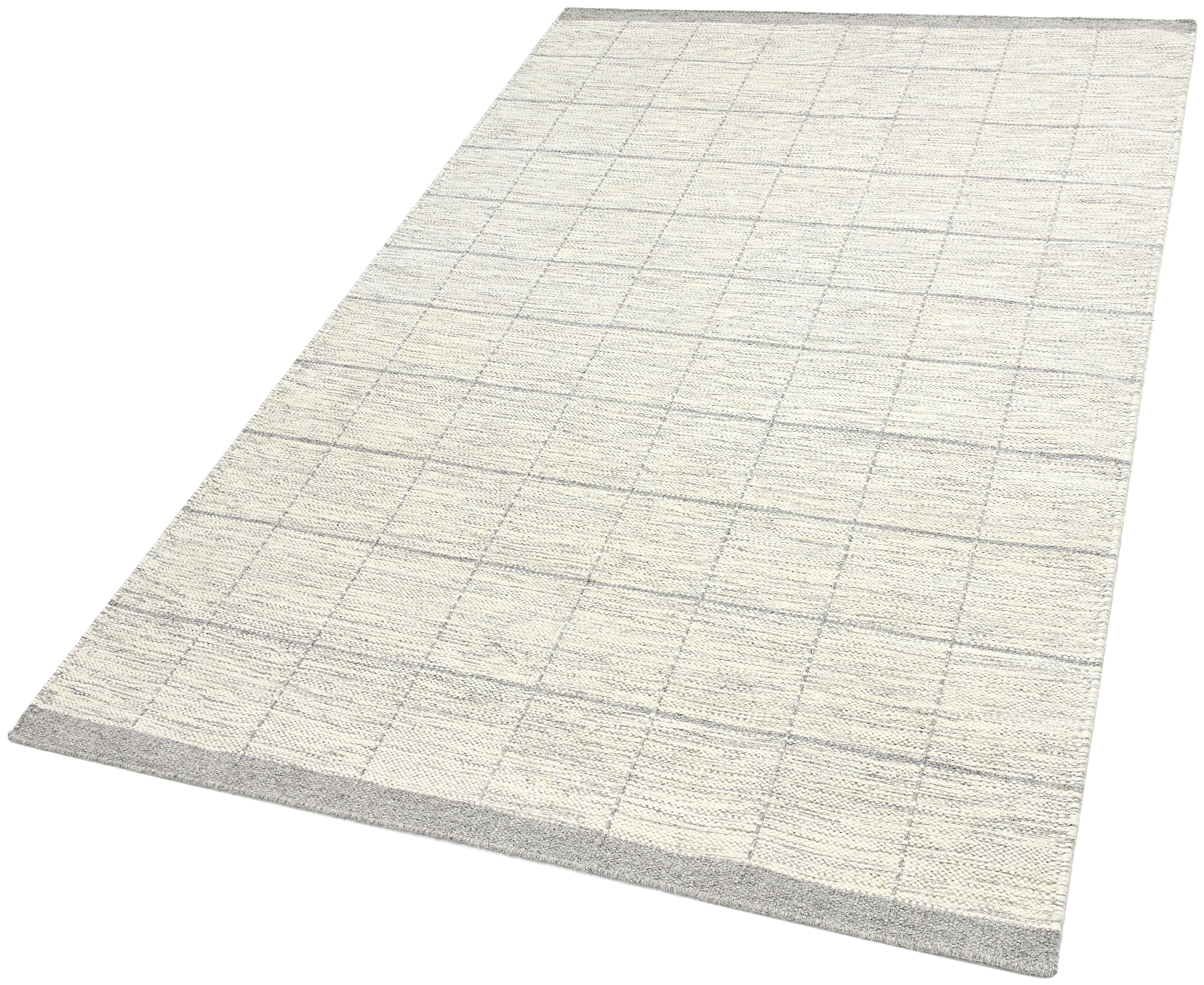 Beige neutral area rug with checkered design